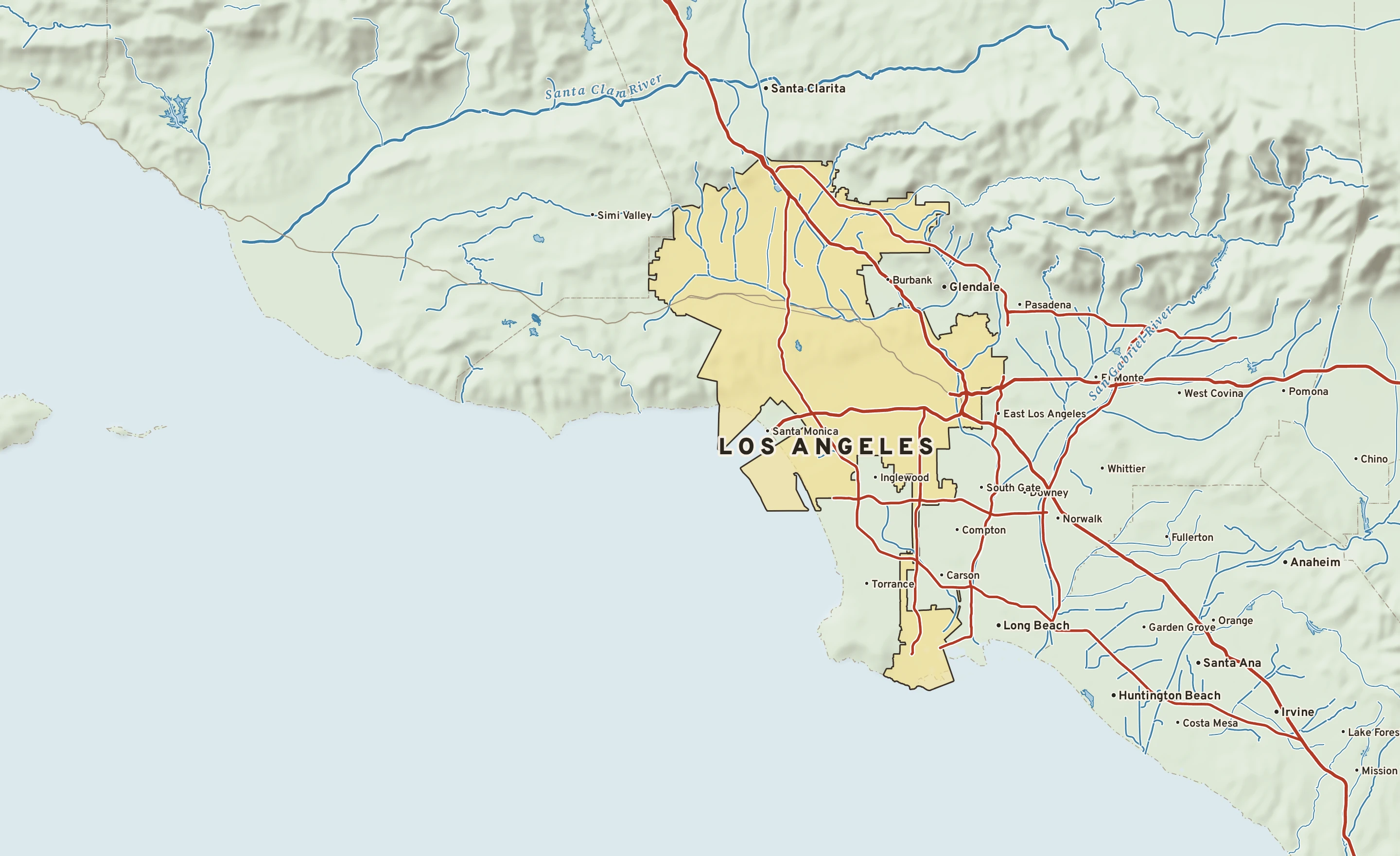 Shaded-relief atlas plate of Los Angeles, California: rivers, roads, the city limits and where the water drains.
