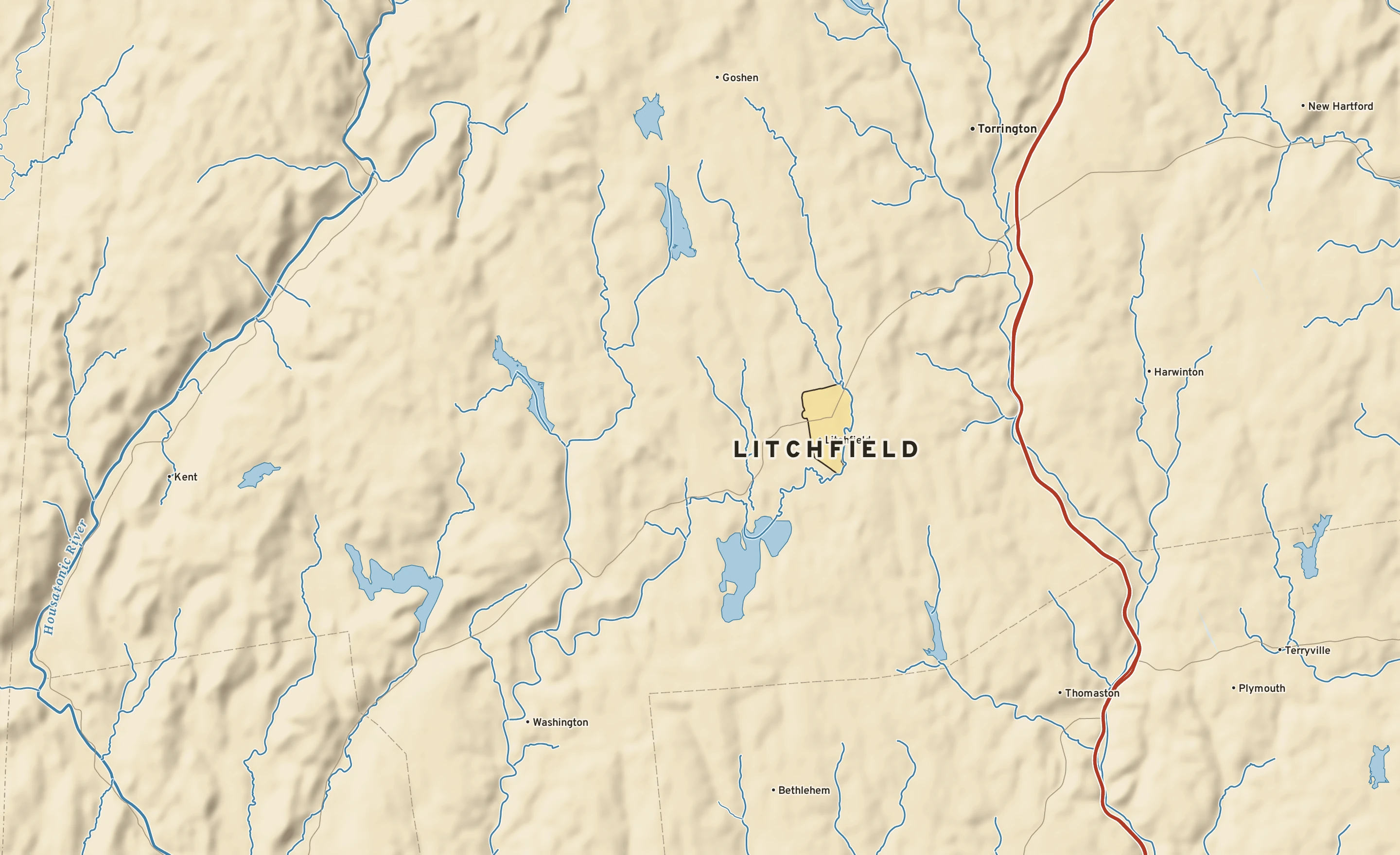 Shaded-relief atlas plate of Litchfield, Connecticut: rivers, roads, the city limits and where the water drains.