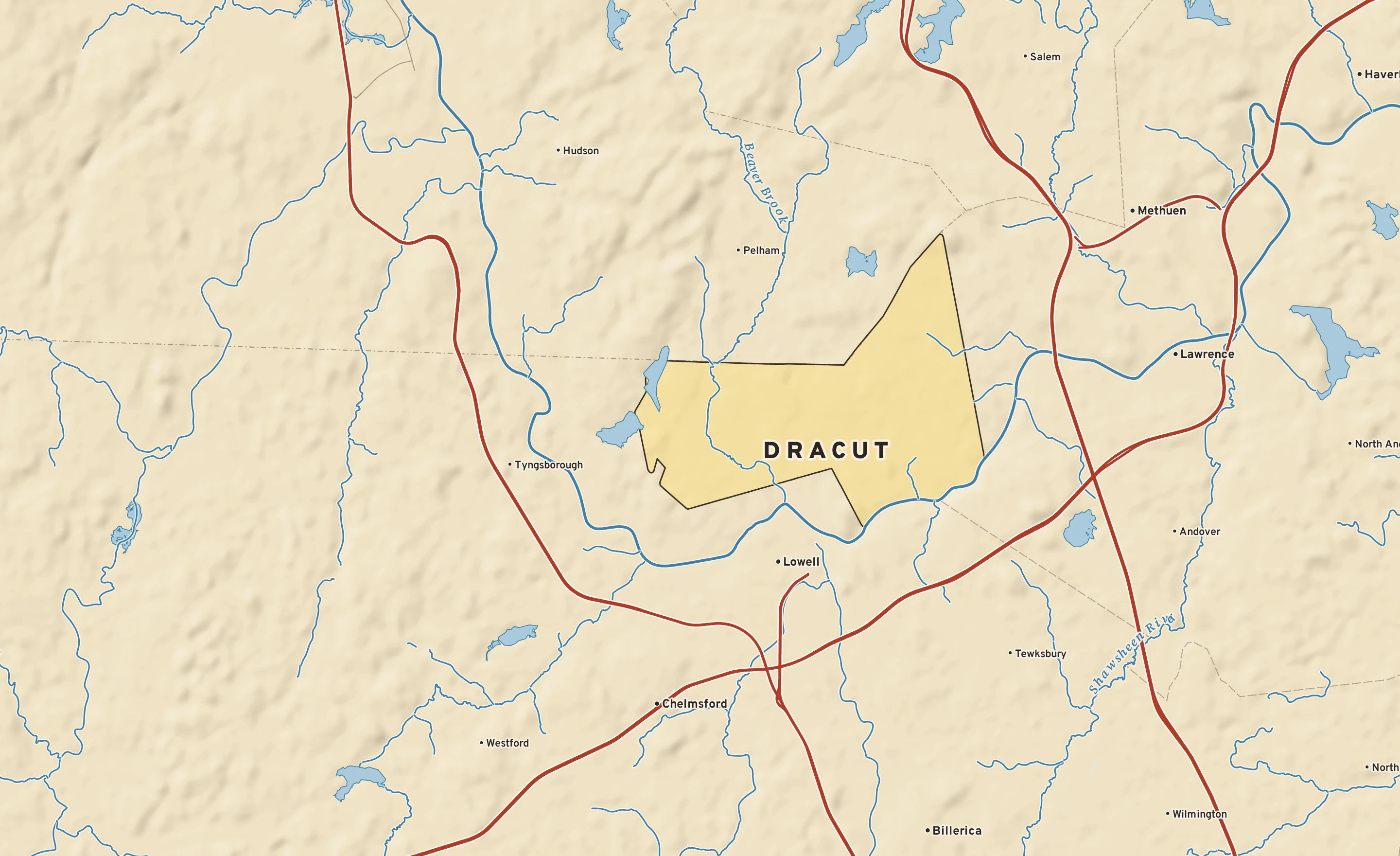 Shaded-relief atlas plate of Dracut, Massachusetts: rivers, roads, the city limits and where the water drains.