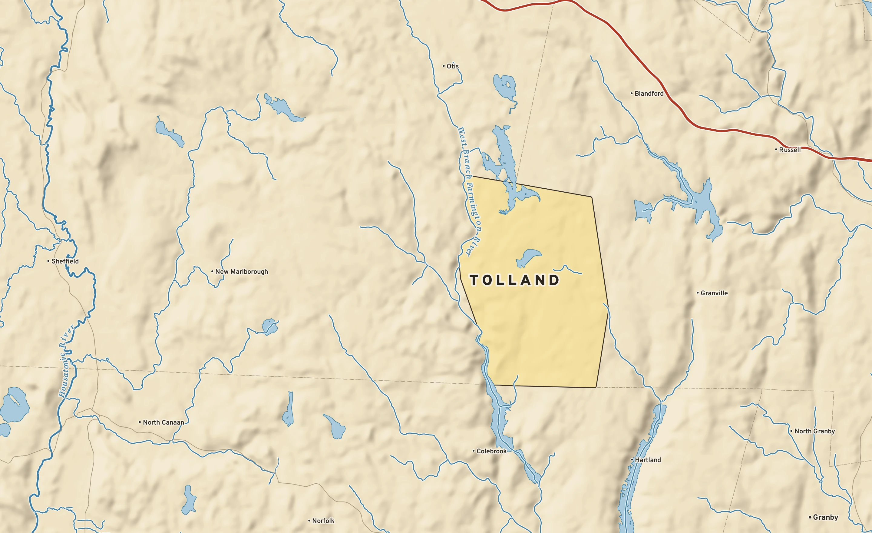 Shaded-relief atlas plate of Tolland, Massachusetts: rivers, roads, the city limits and where the water drains.