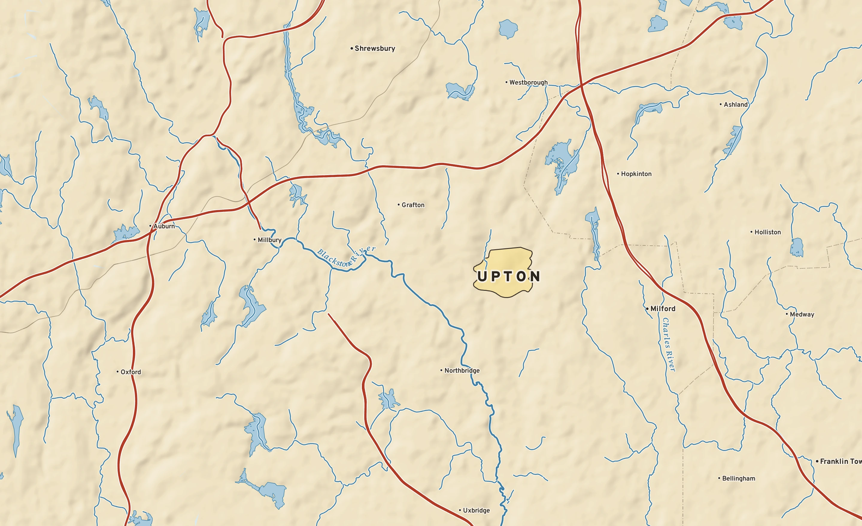Shaded-relief atlas plate of Upton, Massachusetts: rivers, roads, the city limits and where the water drains.