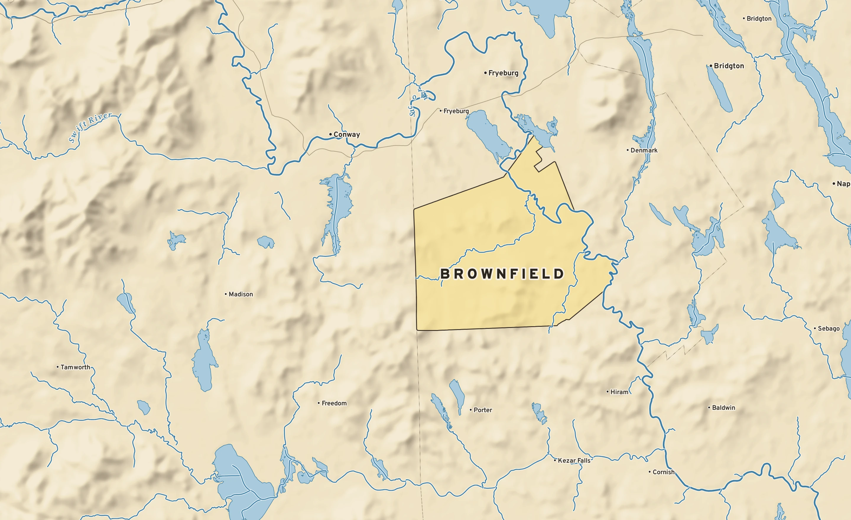 Shaded-relief atlas plate of Brownfield, Maine: rivers, roads, the city limits and where the water drains.