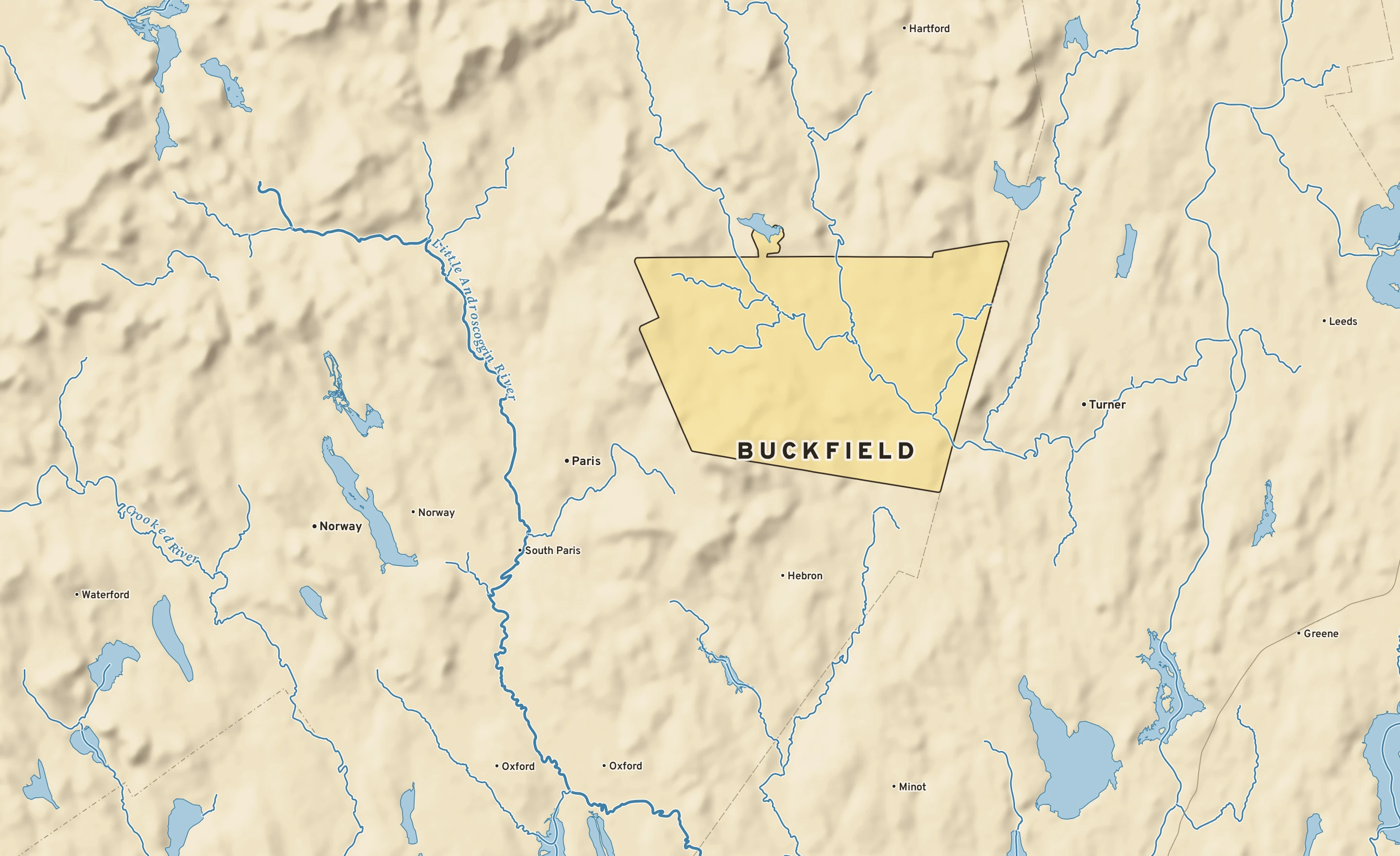 Shaded-relief atlas plate of Buckfield, Maine: rivers, roads, the city limits and where the water drains.