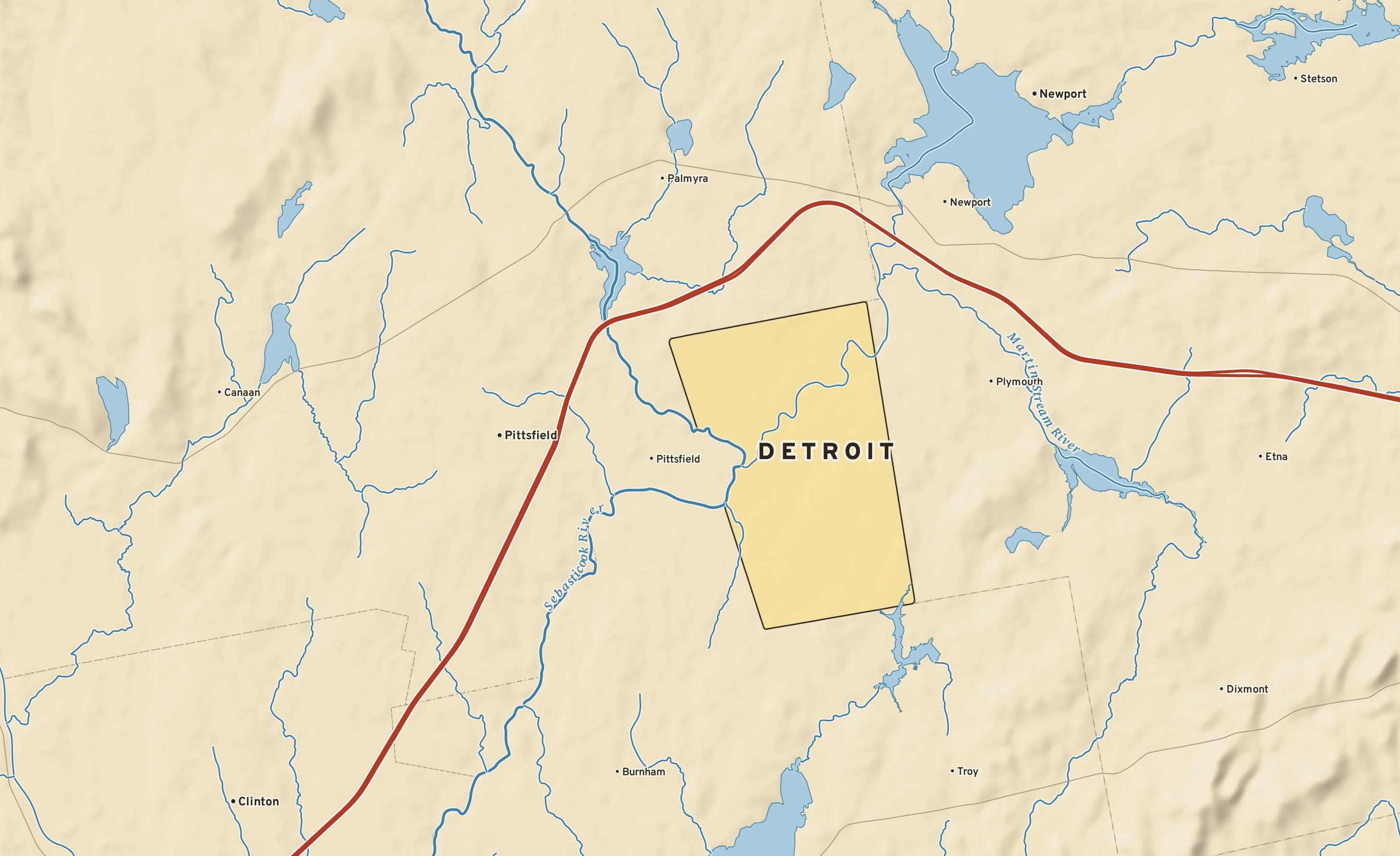 Shaded-relief atlas plate of Detroit, Maine: rivers, roads, the city limits and where the water drains.