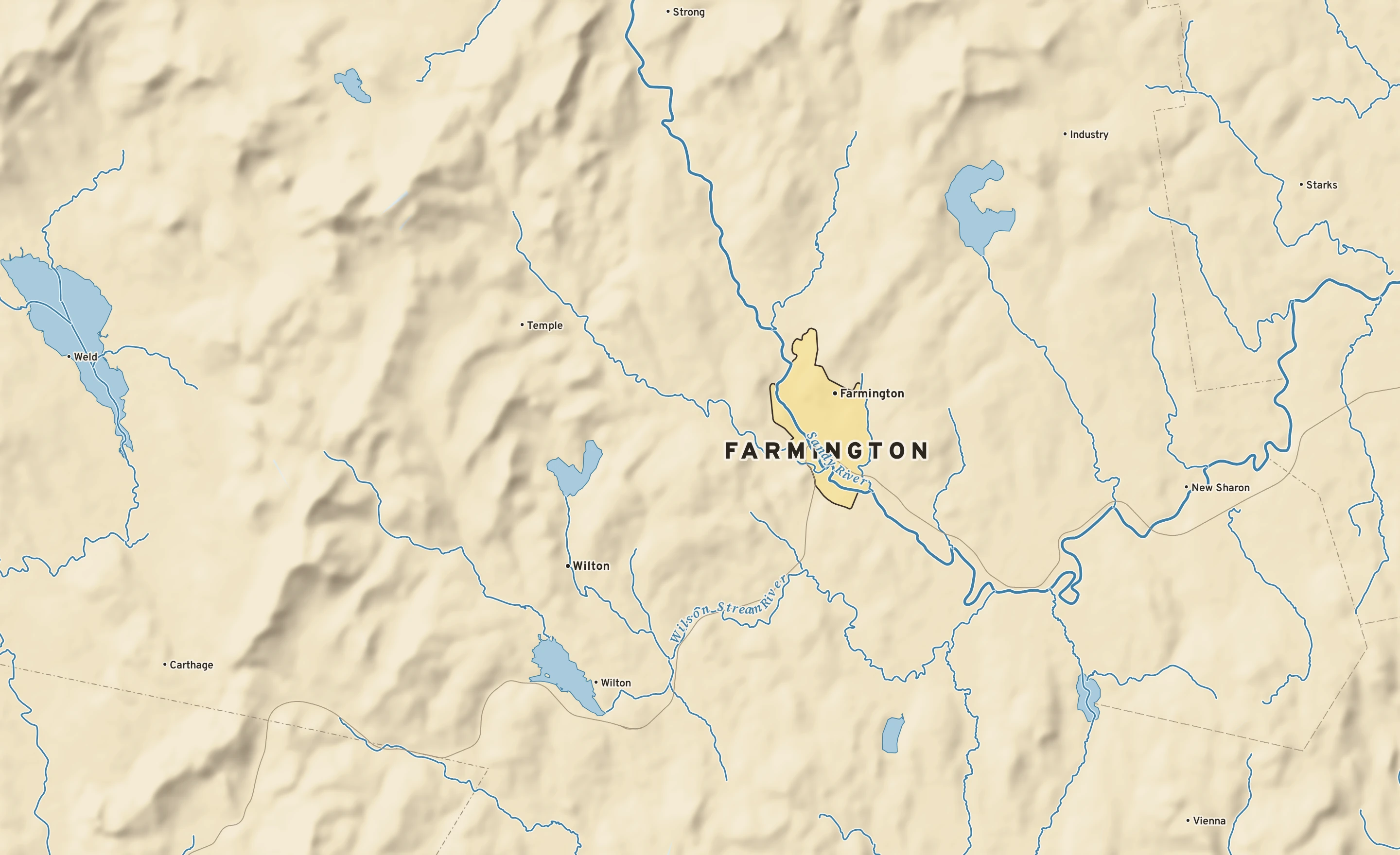 Shaded-relief atlas plate of Farmington, Maine: rivers, roads, the city limits and where the water drains.