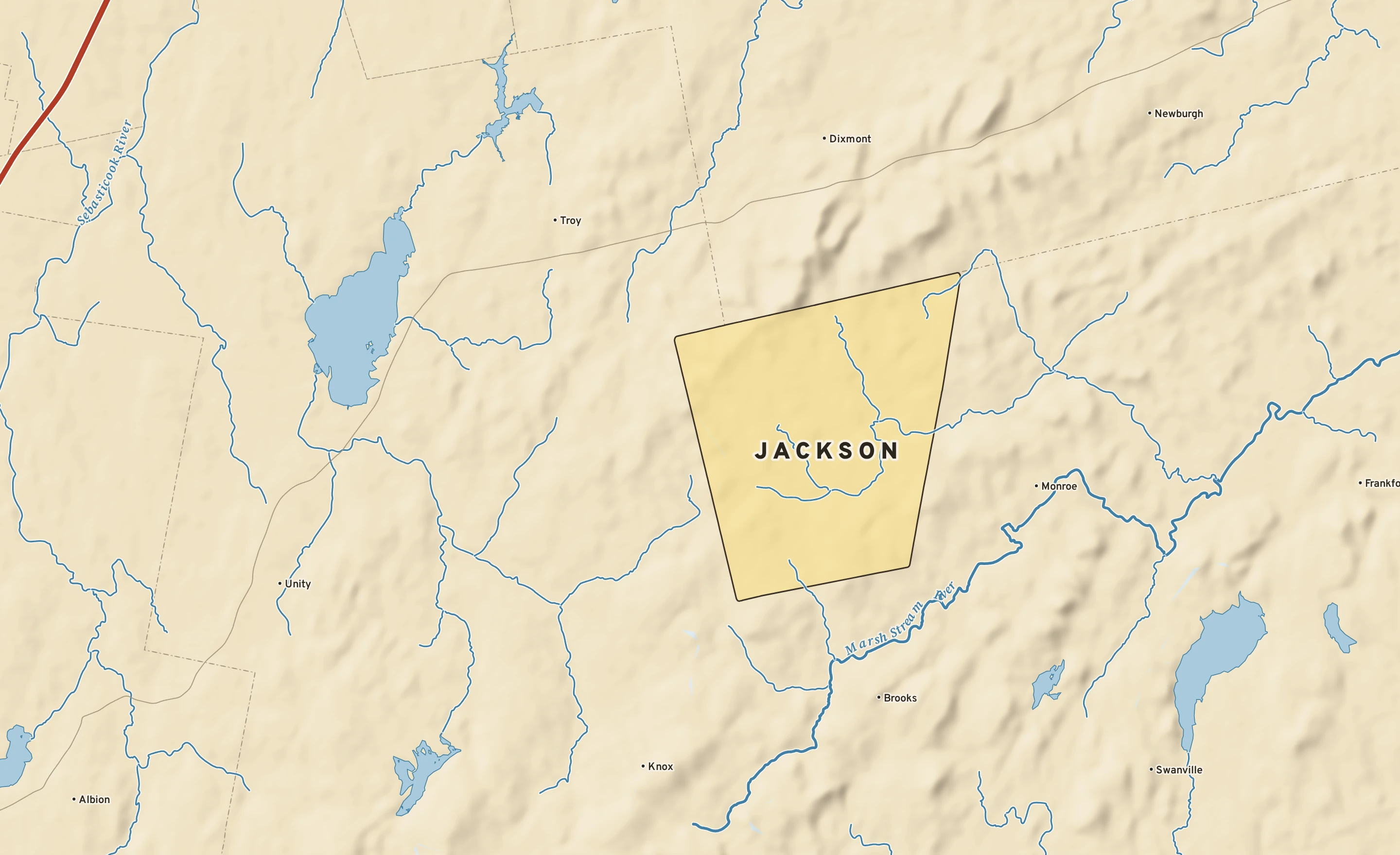 Shaded-relief atlas plate of Jackson, Maine: rivers, roads, the city limits and where the water drains.