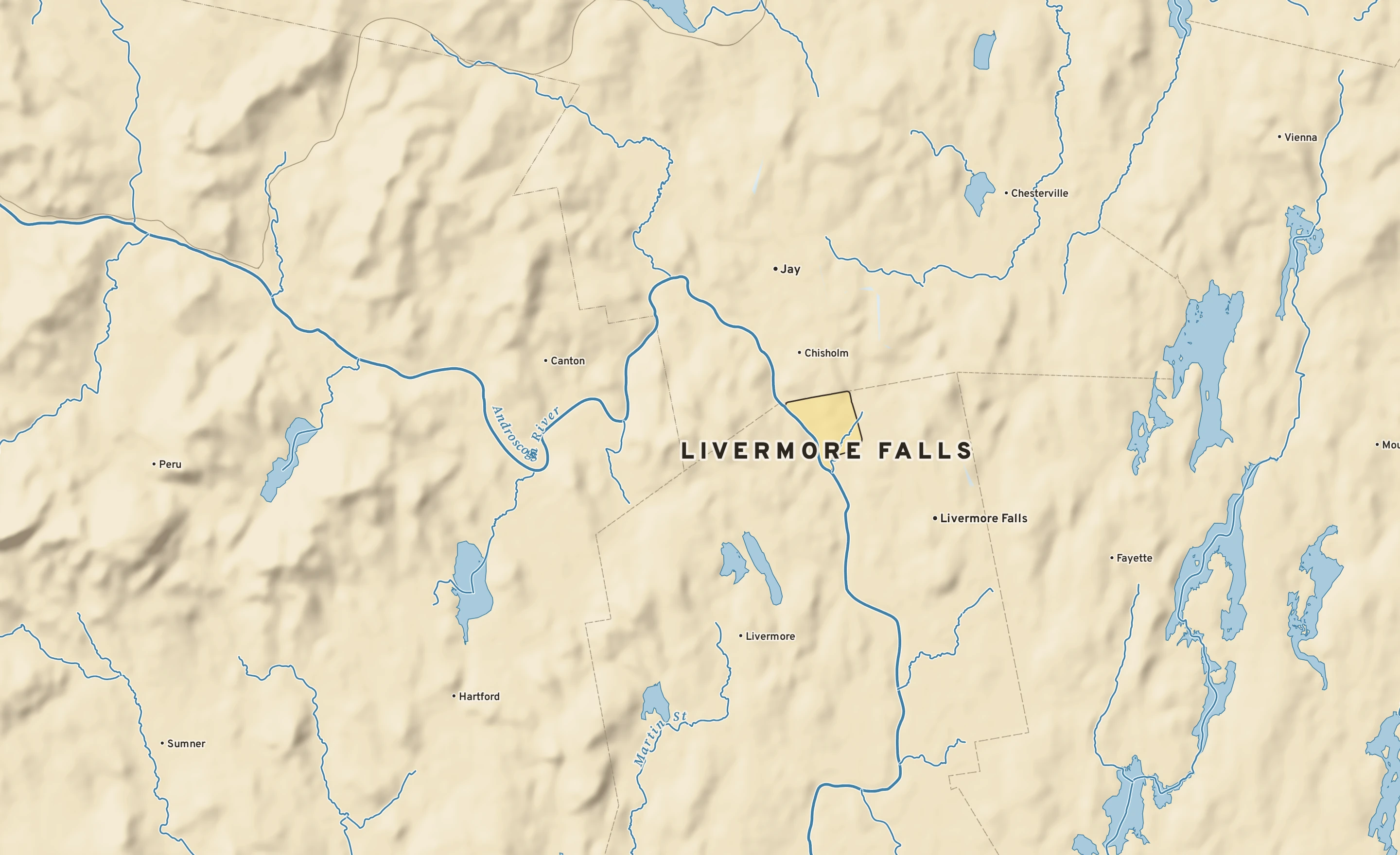 Shaded-relief atlas plate of Livermore Falls, Maine: rivers, roads, the city limits and where the water drains.