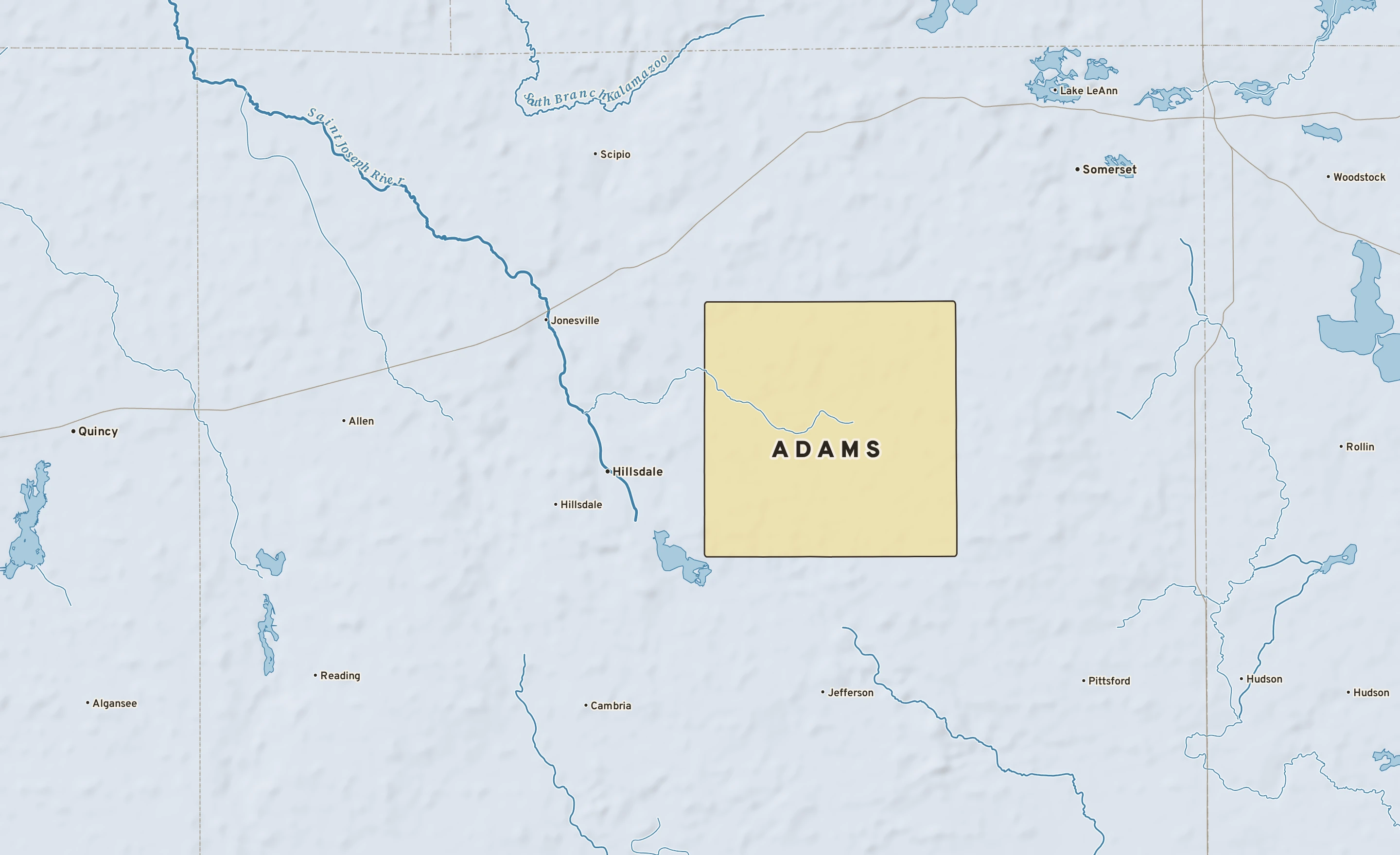 Shaded-relief atlas plate of Adams, Michigan: rivers, roads, the city limits and where the water drains.