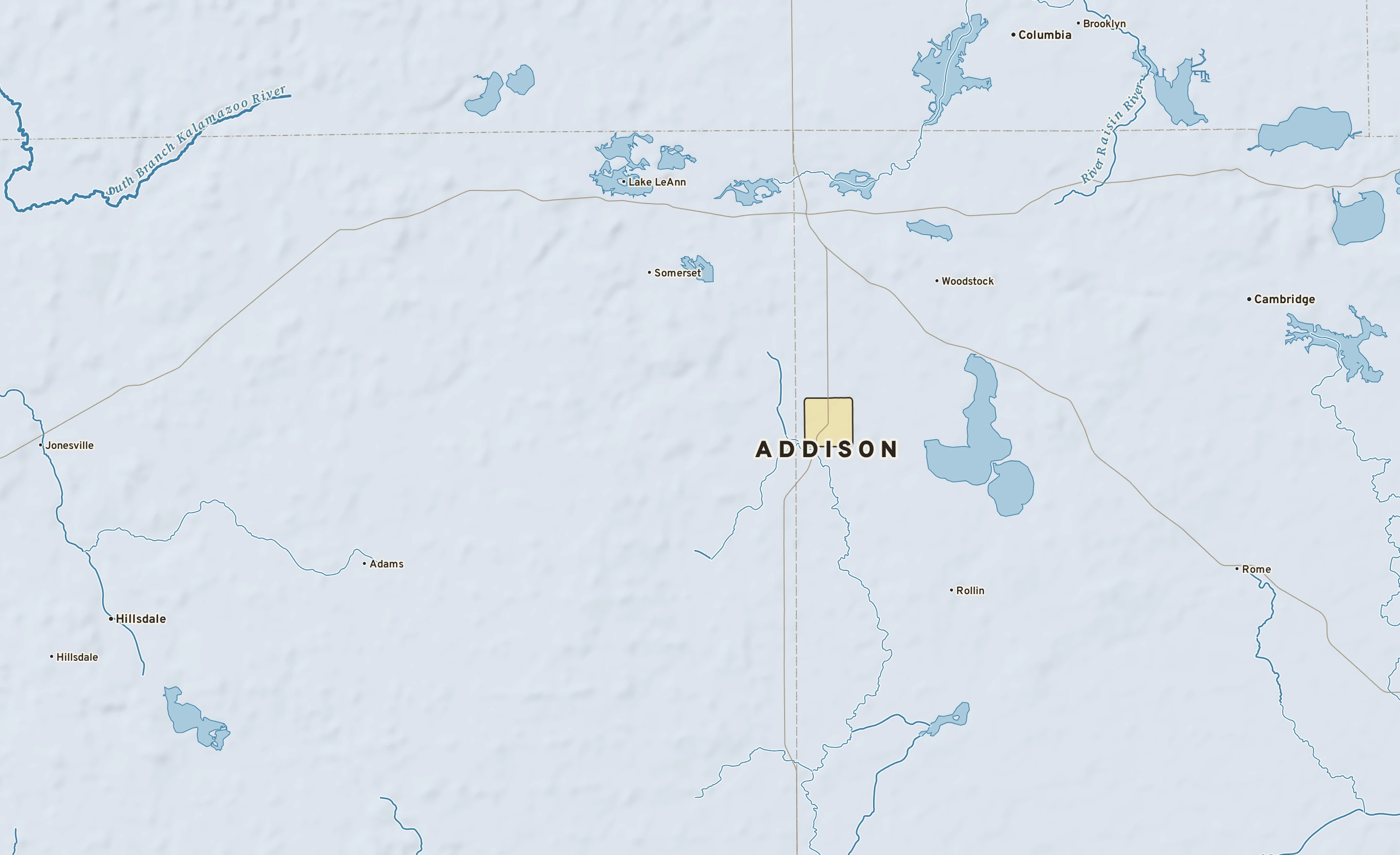 Shaded-relief atlas plate of Addison, Michigan: rivers, roads, the city limits and where the water drains.