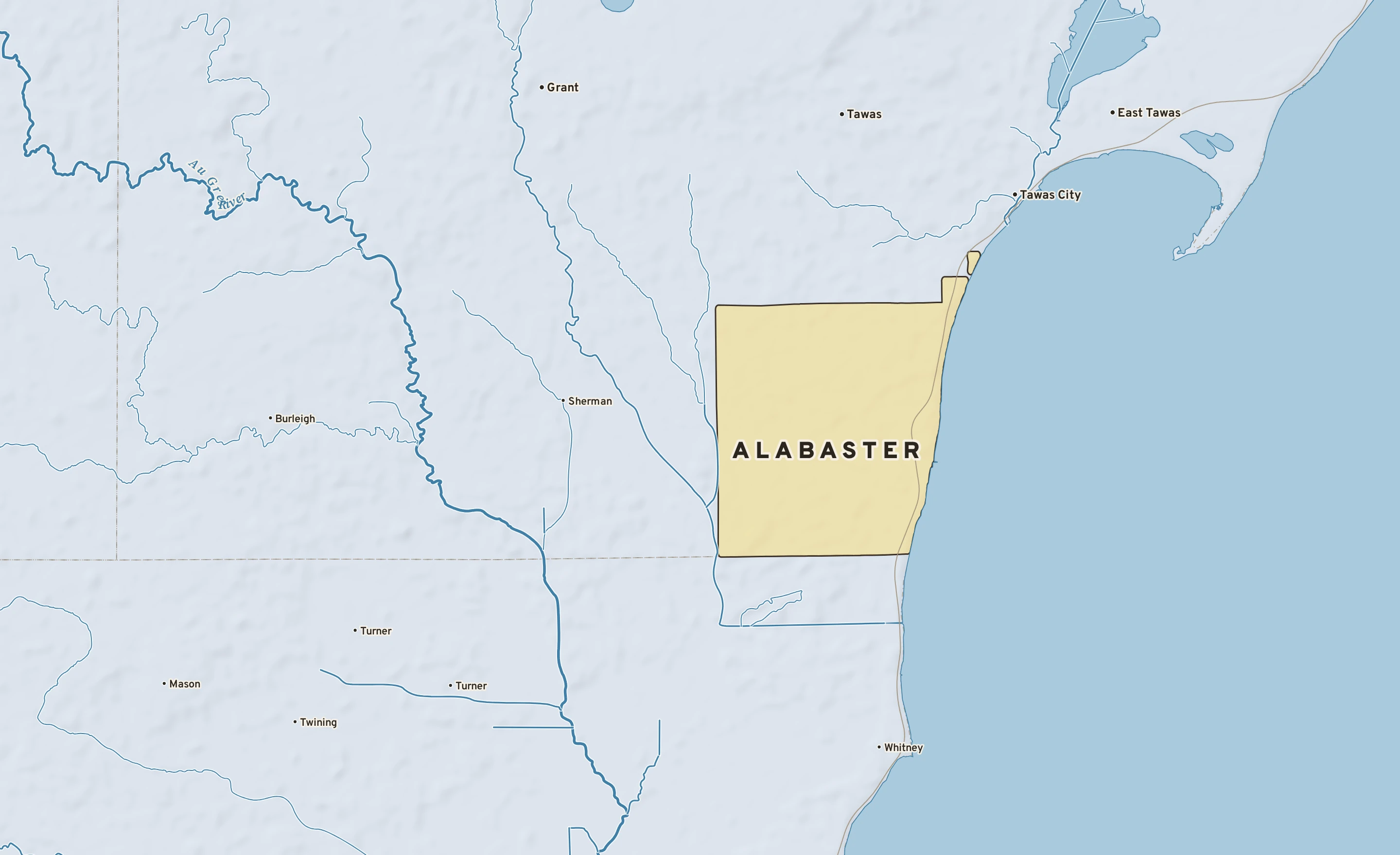 Shaded-relief atlas plate of Alabaster, Michigan: rivers, roads, the city limits and where the water drains.