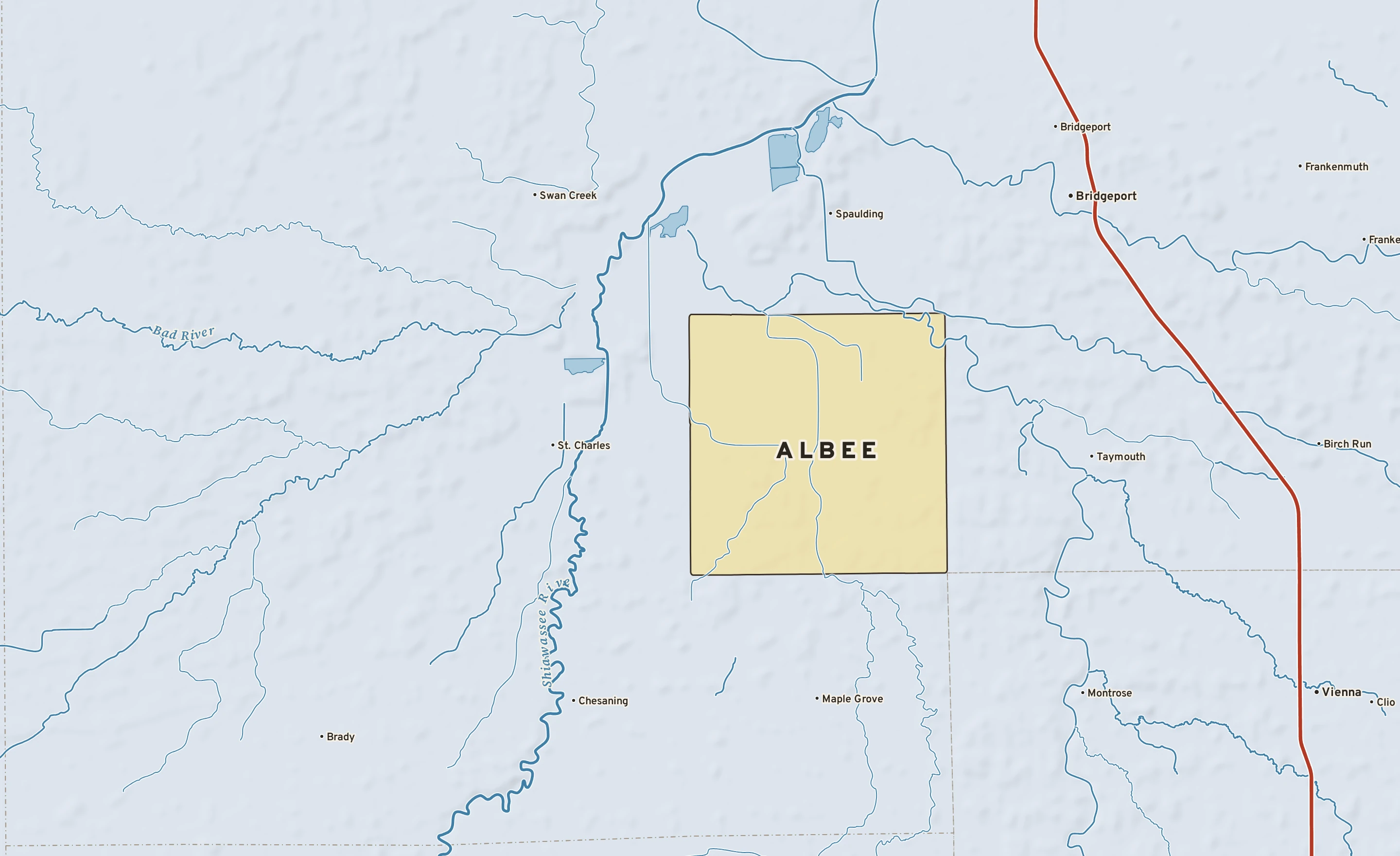 Shaded-relief atlas plate of Albee, Michigan: rivers, roads, the city limits and where the water drains.