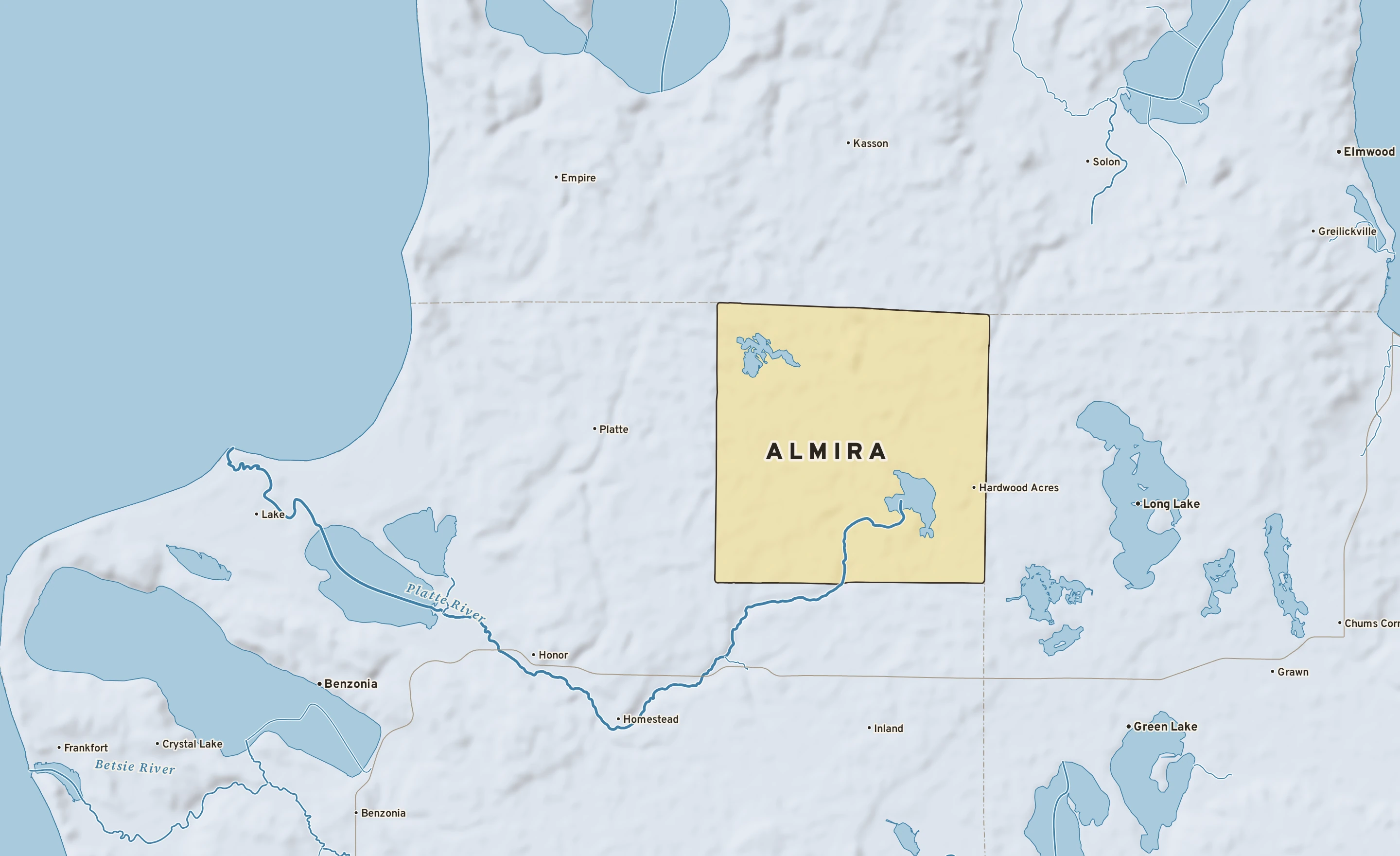 Shaded-relief atlas plate of Almira, Michigan: rivers, roads, the city limits and where the water drains.