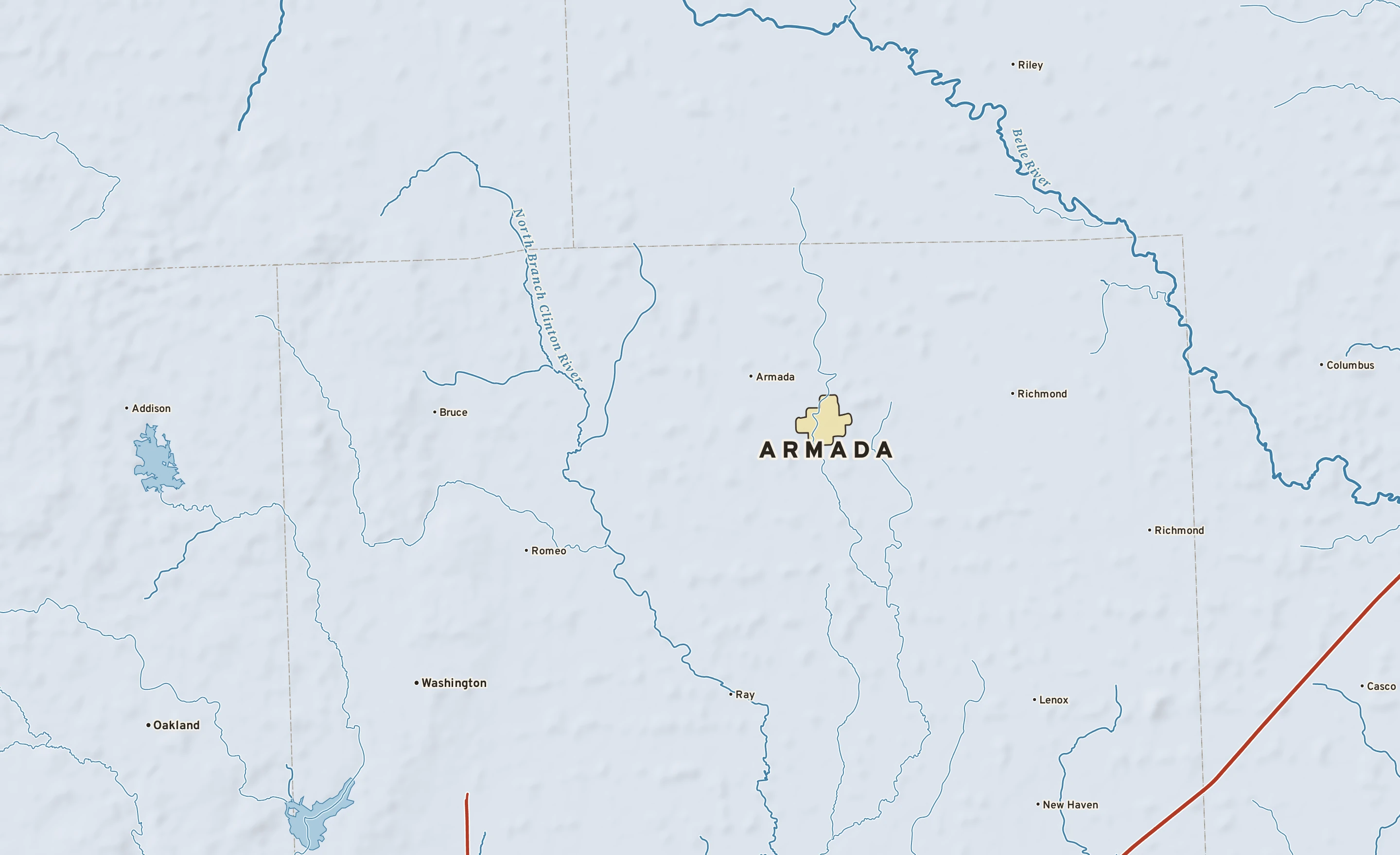 Shaded-relief atlas plate of Armada, Michigan: rivers, roads, the city limits and where the water drains.