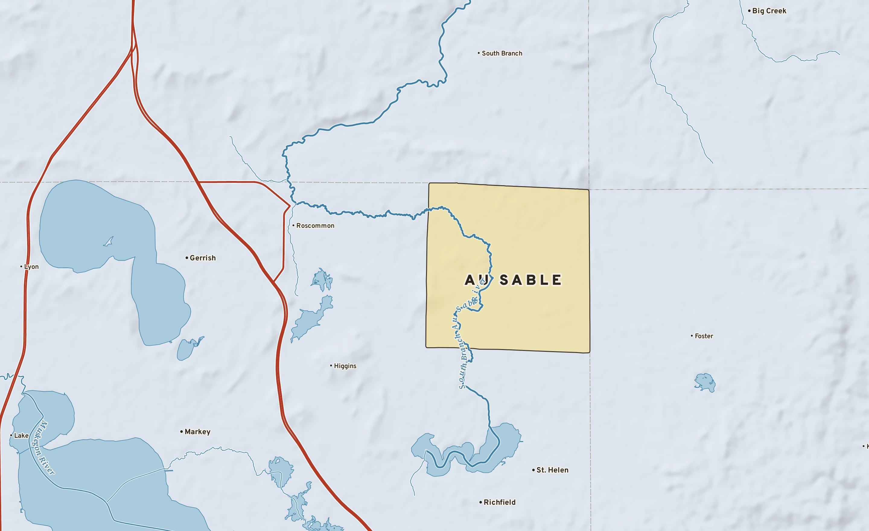 Shaded-relief atlas plate of Au Sable, Michigan: rivers, roads, the city limits and where the water drains.