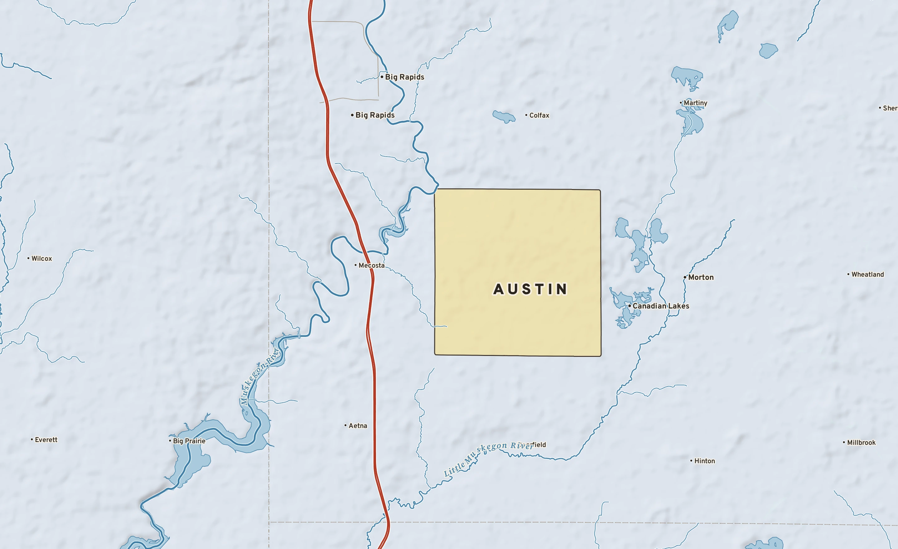 Shaded-relief atlas plate of Austin, Michigan: rivers, roads, the city limits and where the water drains.