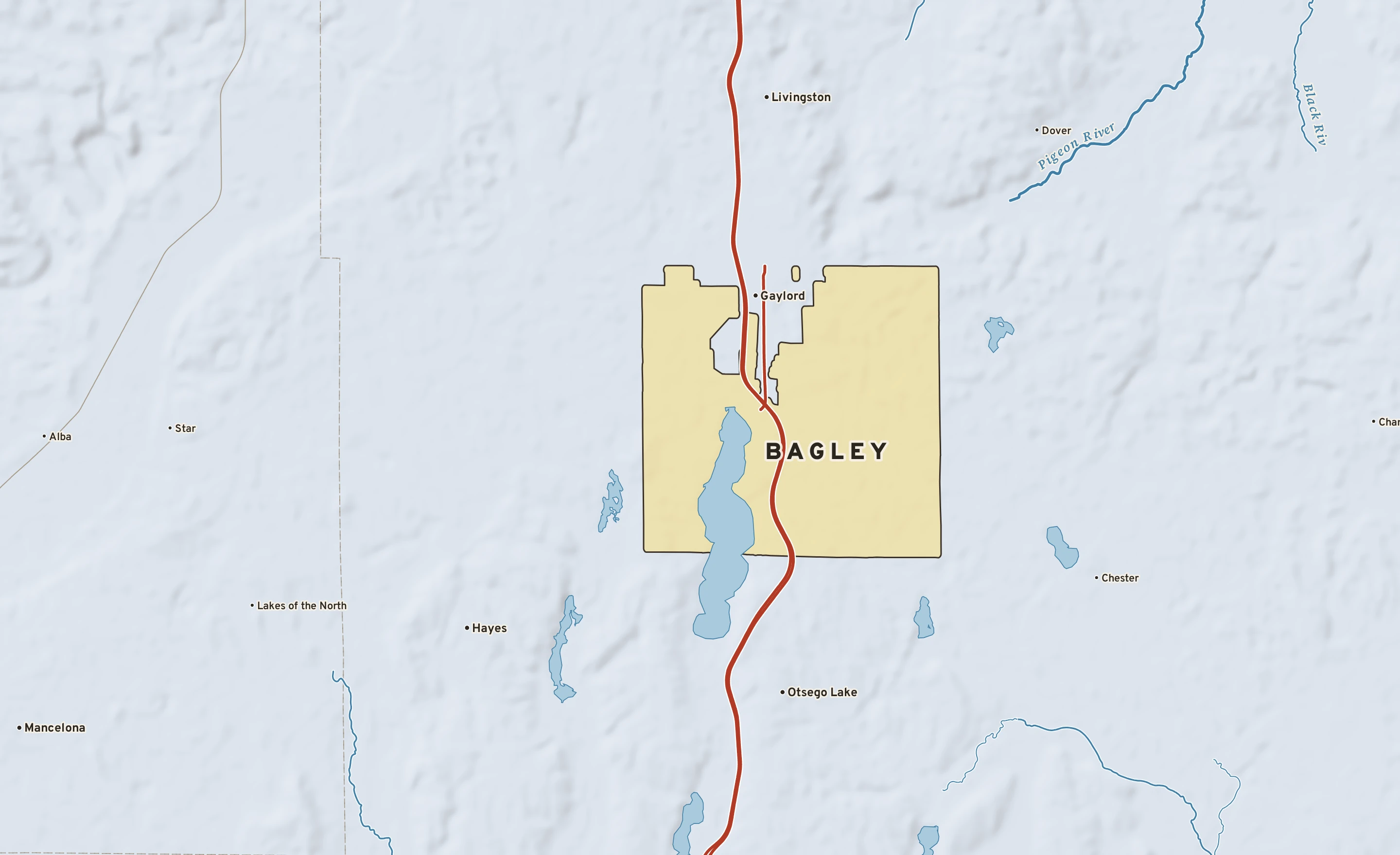 Shaded-relief atlas plate of Bagley, Michigan: rivers, roads, the city limits and where the water drains.