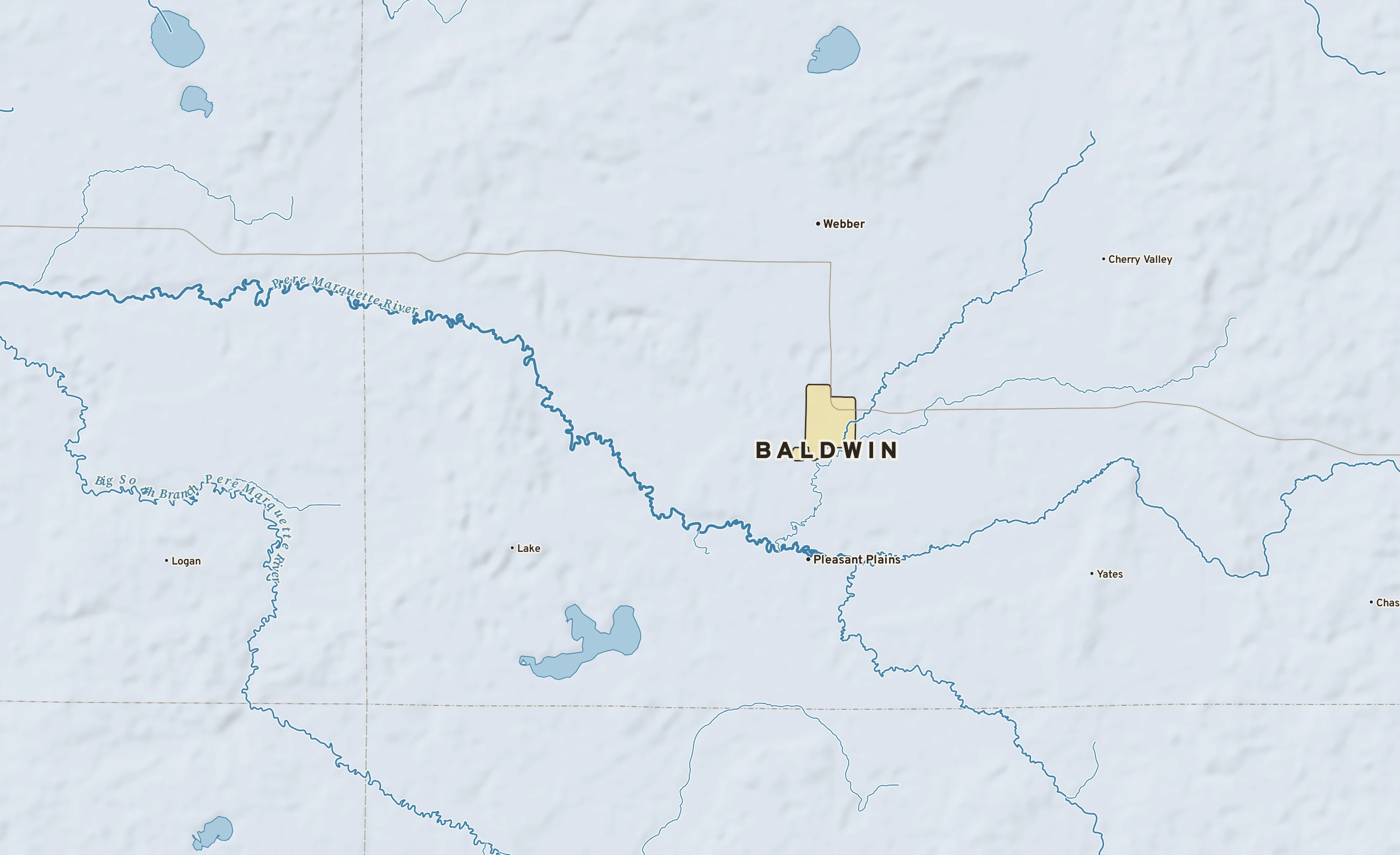 Shaded-relief atlas plate of Baldwin, Michigan: rivers, roads, the city limits and where the water drains.