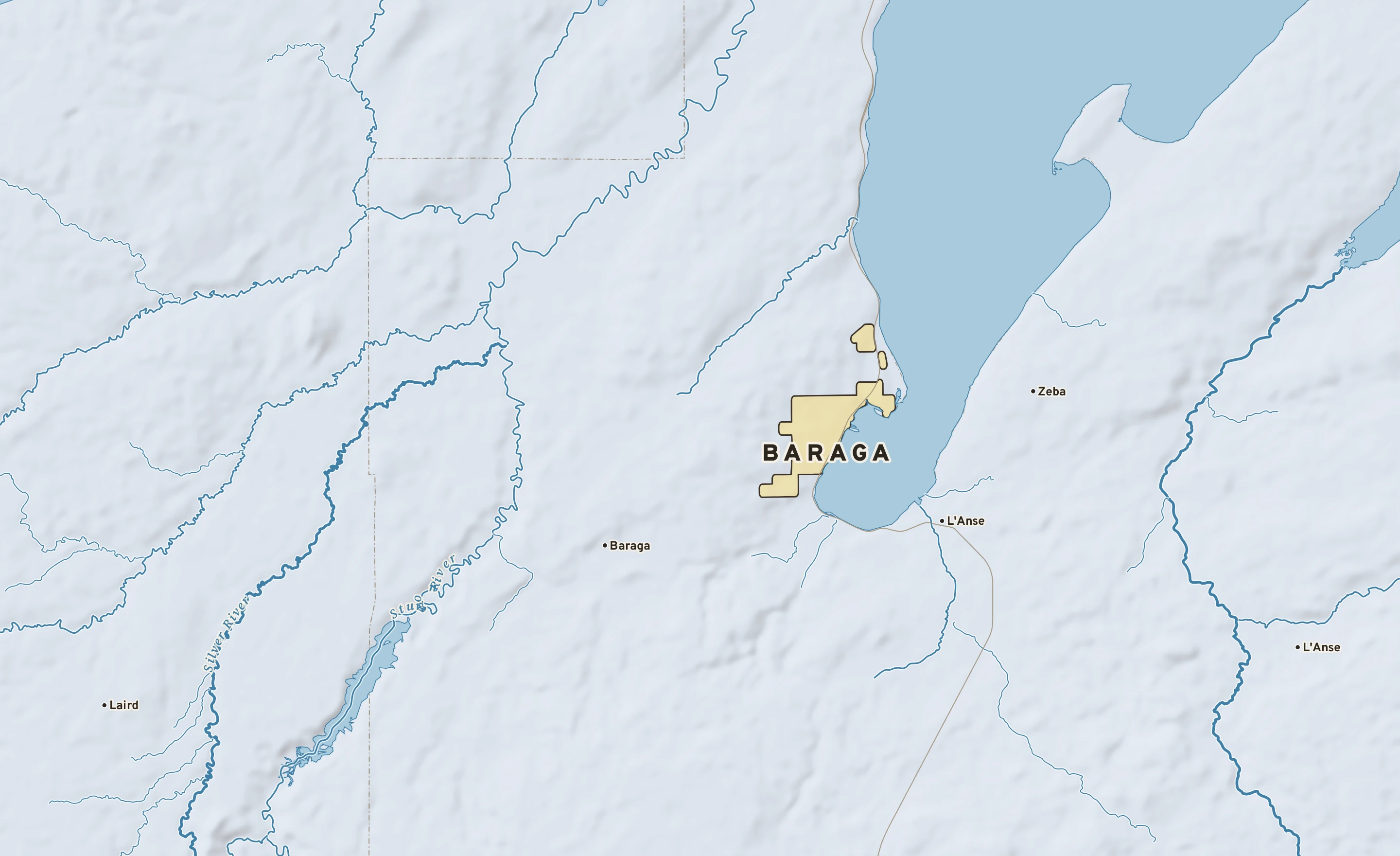 Shaded-relief atlas plate of Baraga, Michigan: rivers, roads, the city limits and where the water drains.