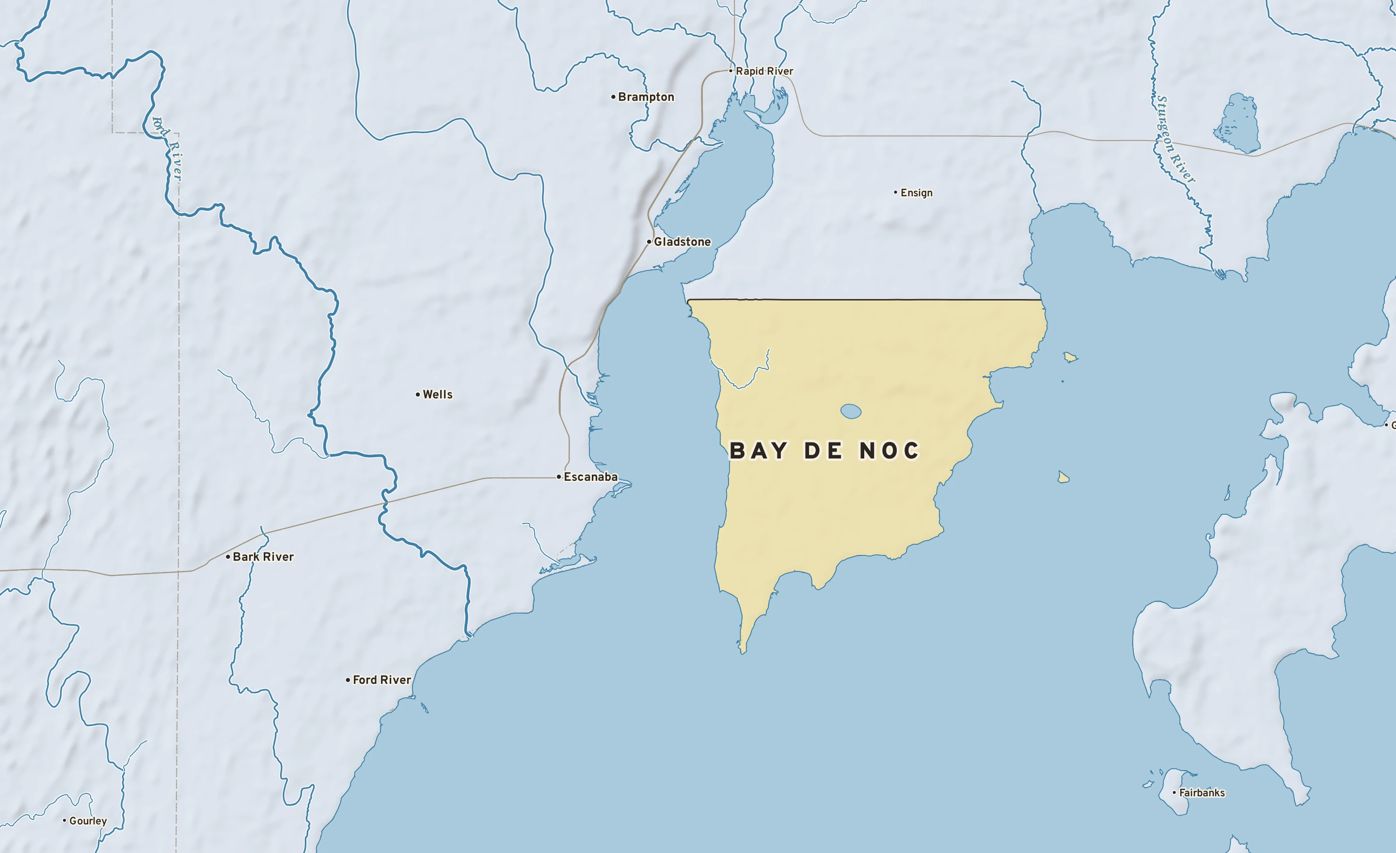 Shaded-relief atlas plate of Bay de Noc, Michigan: rivers, roads, the city limits and where the water drains.