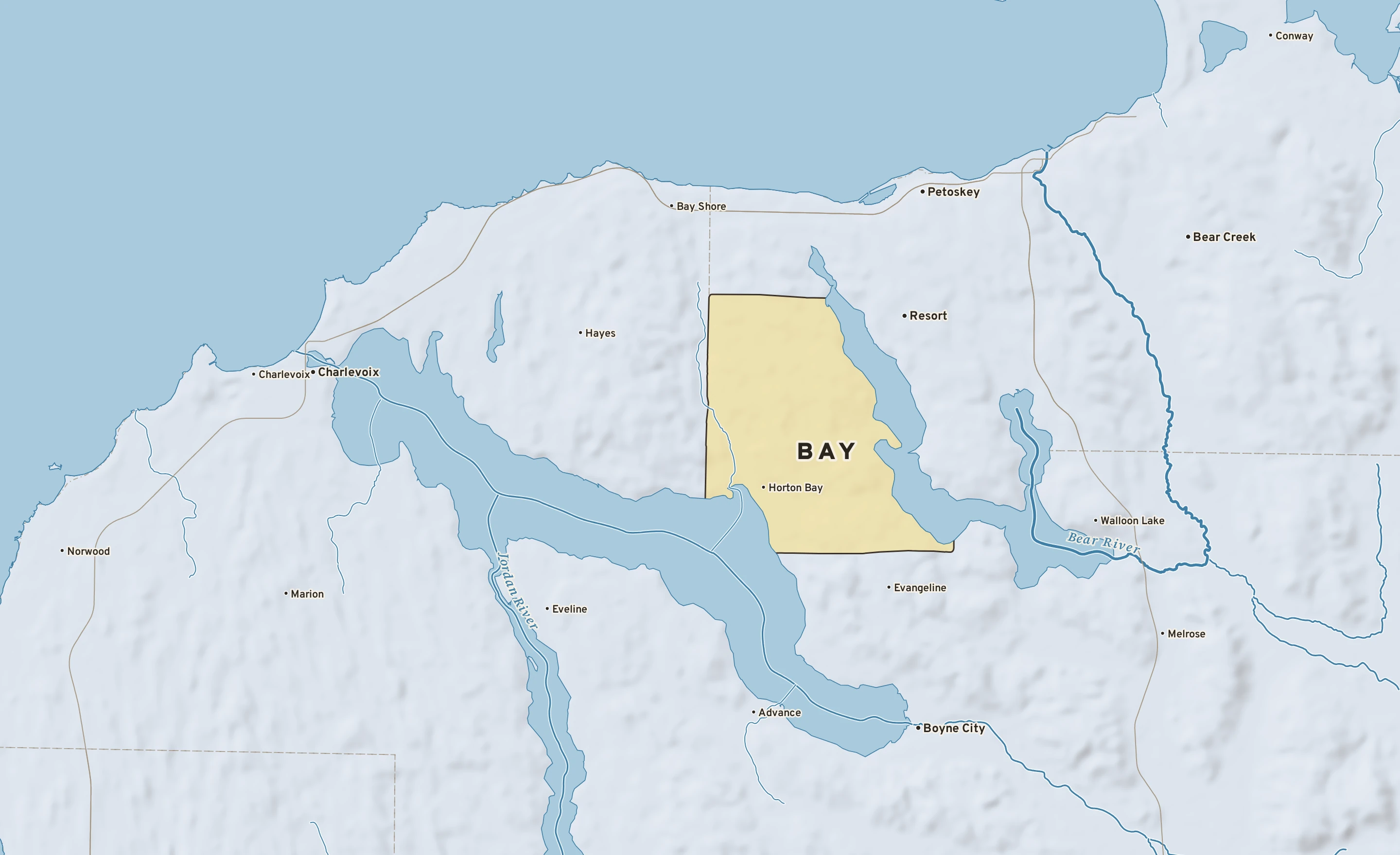 Shaded-relief atlas plate of Bay, Michigan: rivers, roads, the city limits and where the water drains.