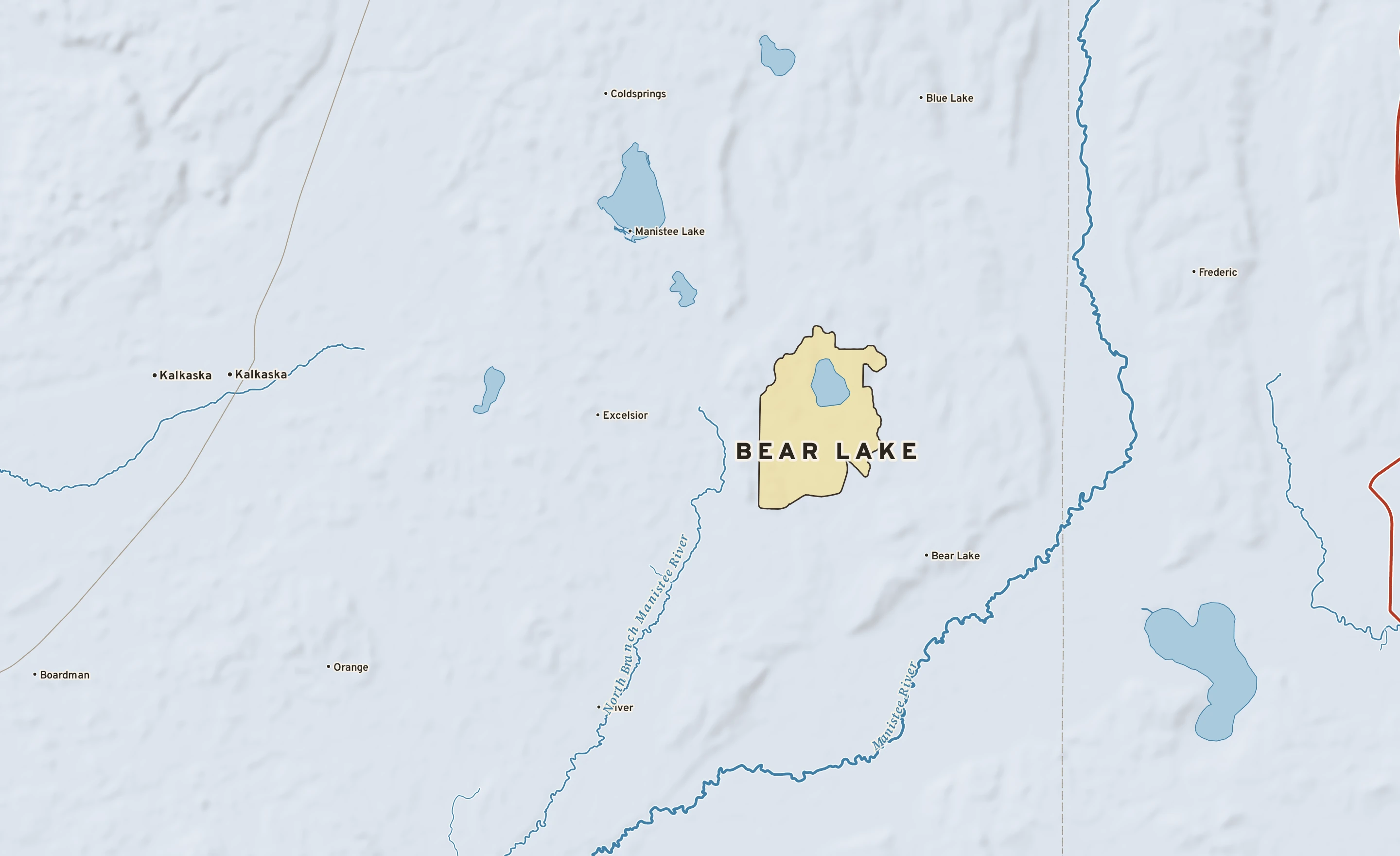 Shaded-relief atlas plate of Bear Lake, Michigan: rivers, roads, the city limits and where the water drains.