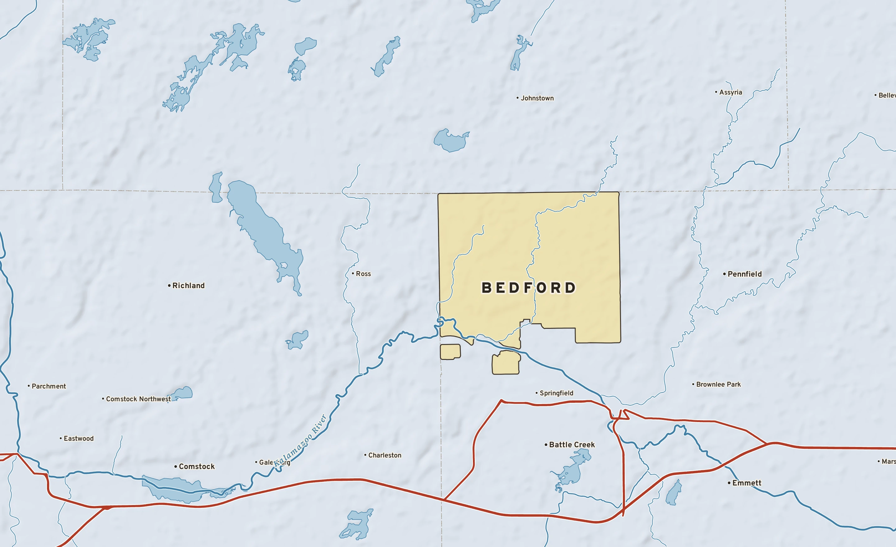 Shaded-relief atlas plate of Bedford, Michigan: rivers, roads, the city limits and where the water drains.