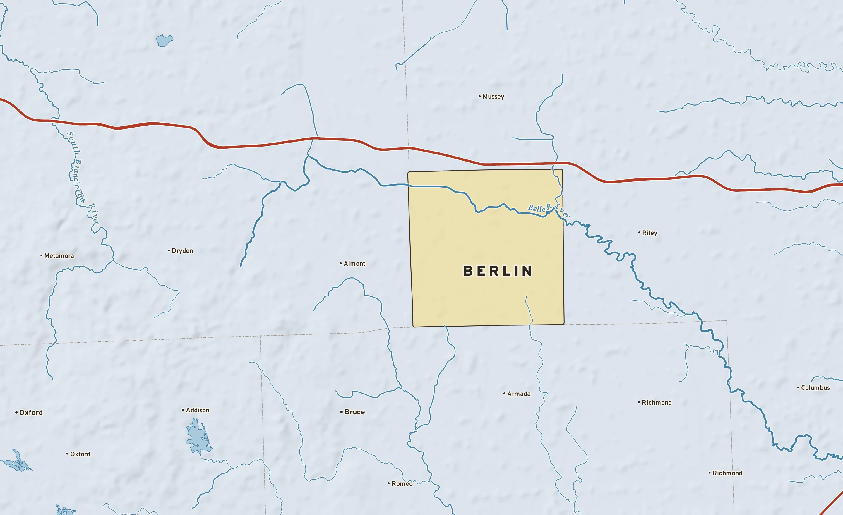 Shaded-relief atlas plate of Berlin, Michigan: rivers, roads, the city limits and where the water drains.