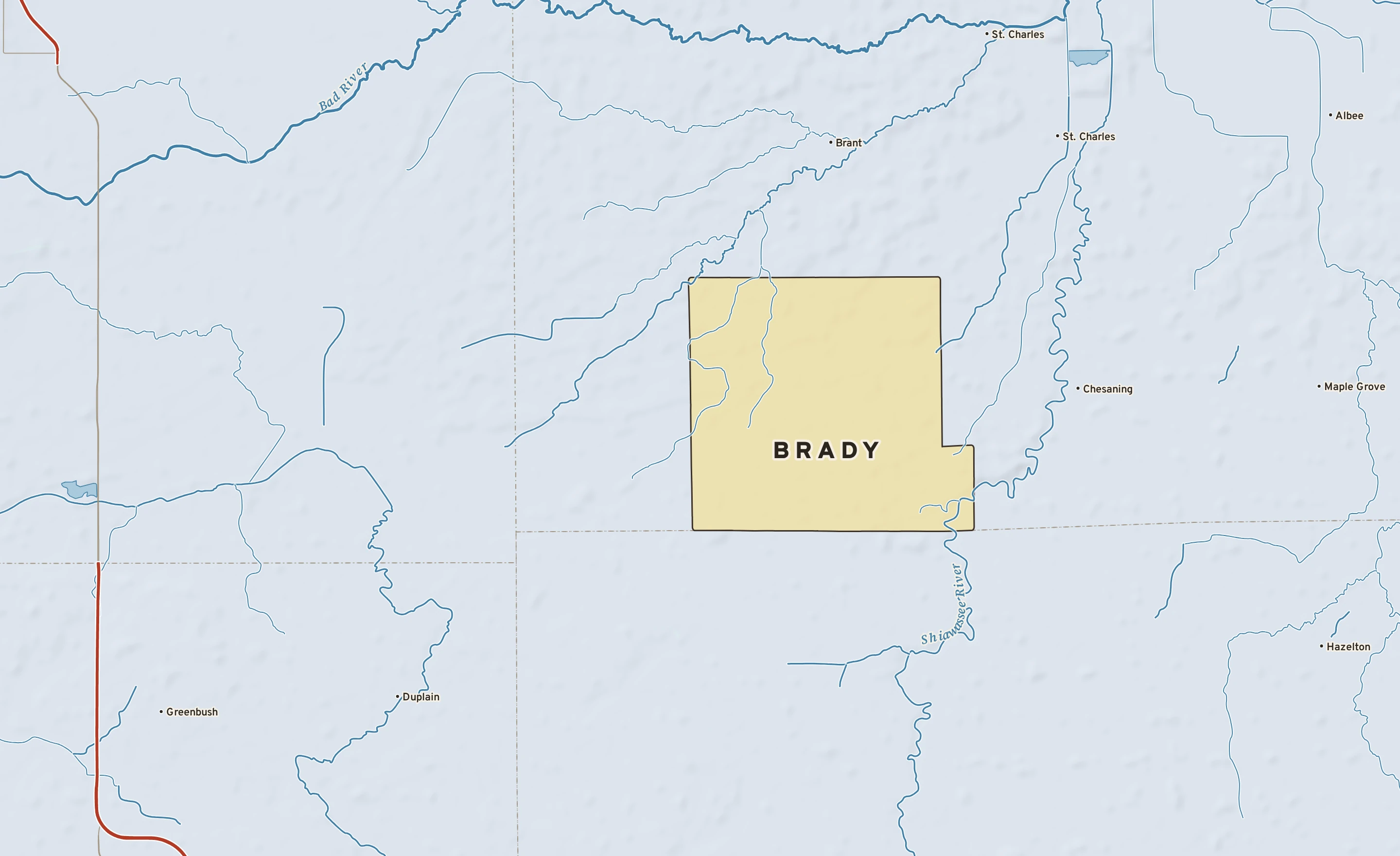 Shaded-relief atlas plate of Brady, Michigan: rivers, roads, the city limits and where the water drains.