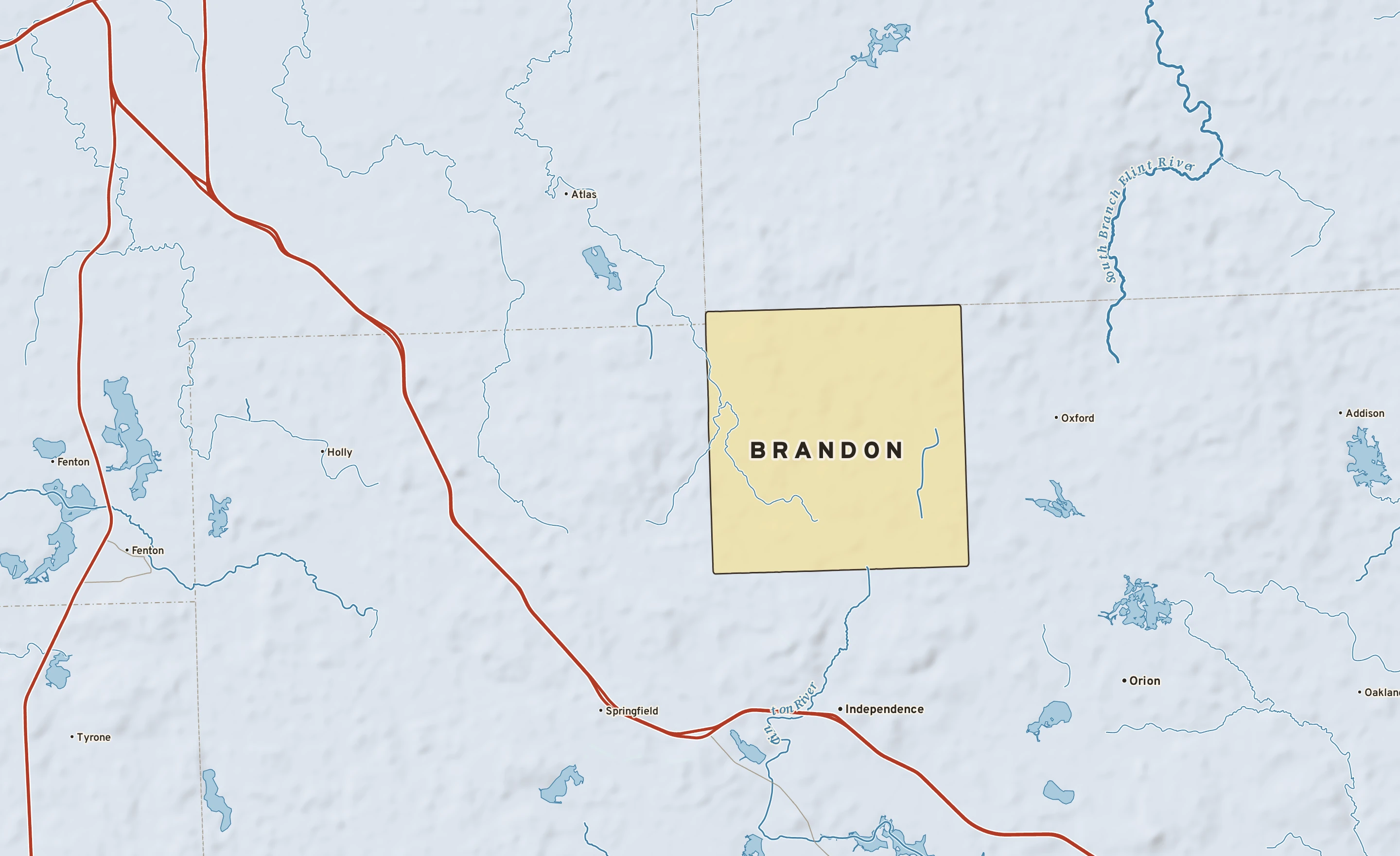 Shaded-relief atlas plate of Brandon, Michigan: rivers, roads, the city limits and where the water drains.