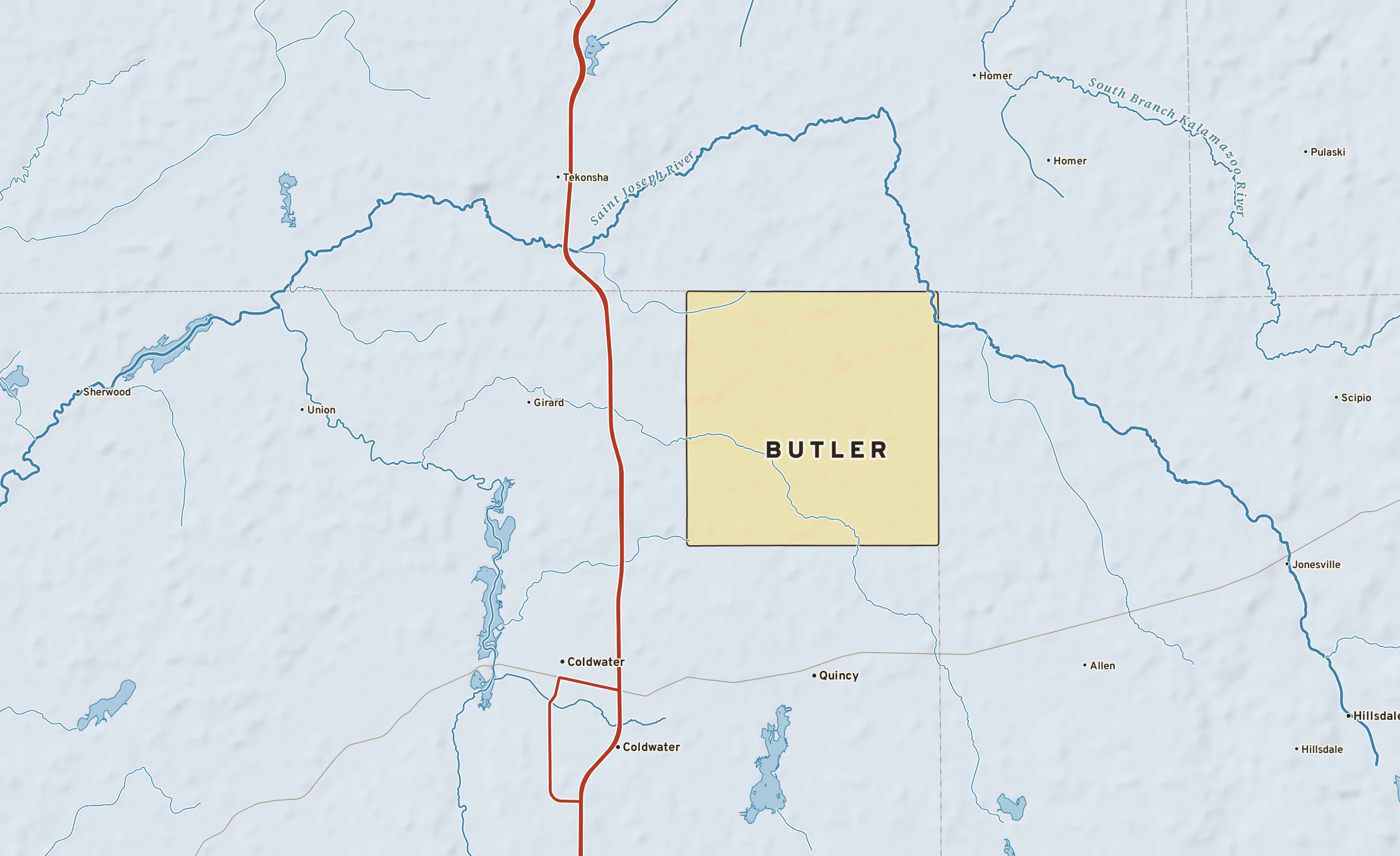 Shaded-relief atlas plate of Butler, Michigan: rivers, roads, the city limits and where the water drains.
