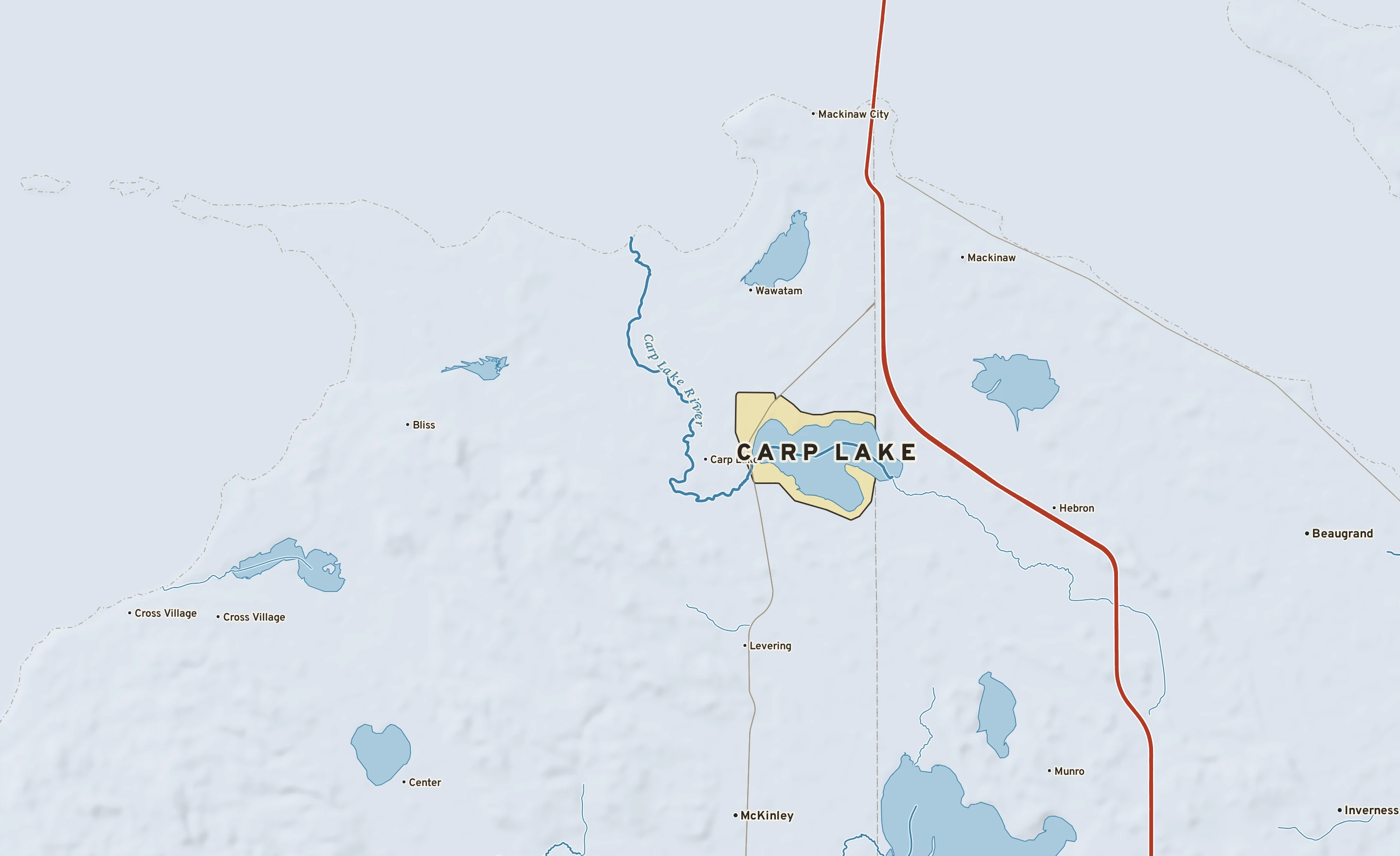 Shaded-relief atlas plate of Carp Lake, Michigan: rivers, roads, the city limits and where the water drains.