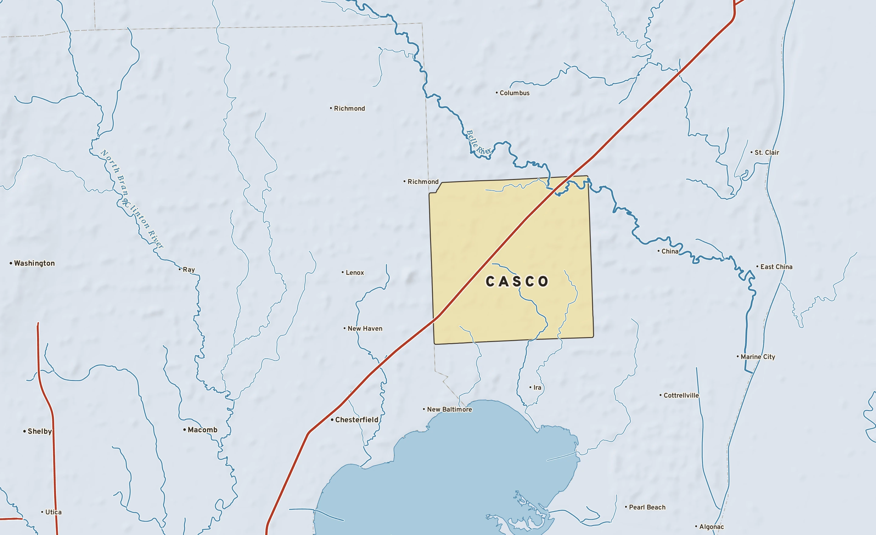 Shaded-relief atlas plate of Casco, Michigan: rivers, roads, the city limits and where the water drains.