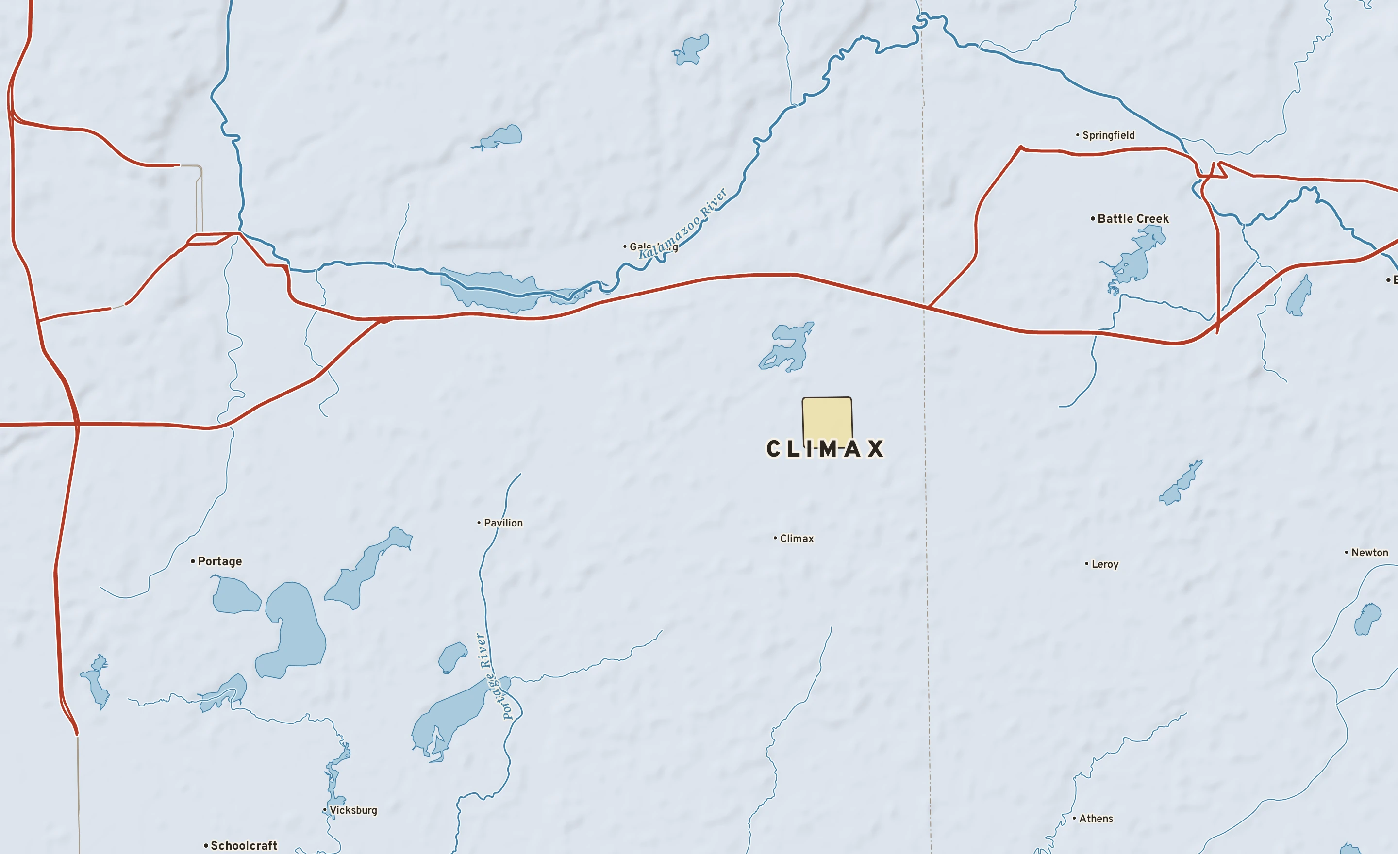 Shaded-relief atlas plate of Climax, Michigan: rivers, roads, the city limits and where the water drains.