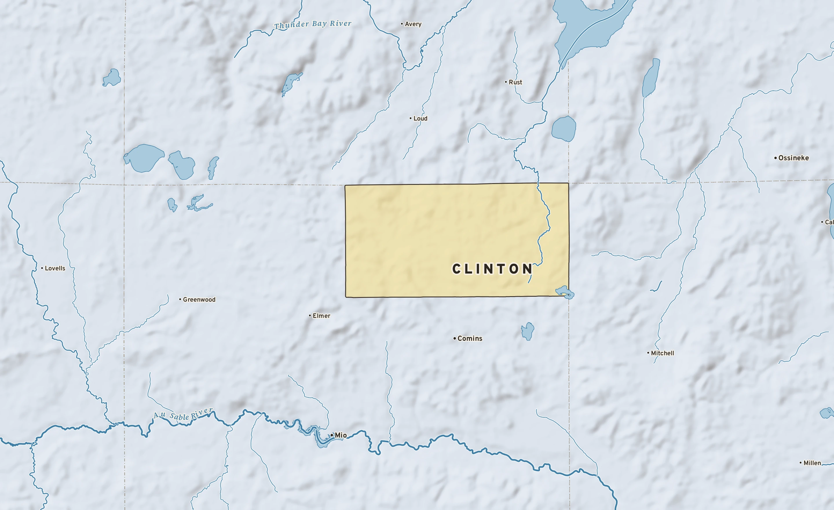Shaded-relief atlas plate of Clinton, Michigan: rivers, roads, the city limits and where the water drains.