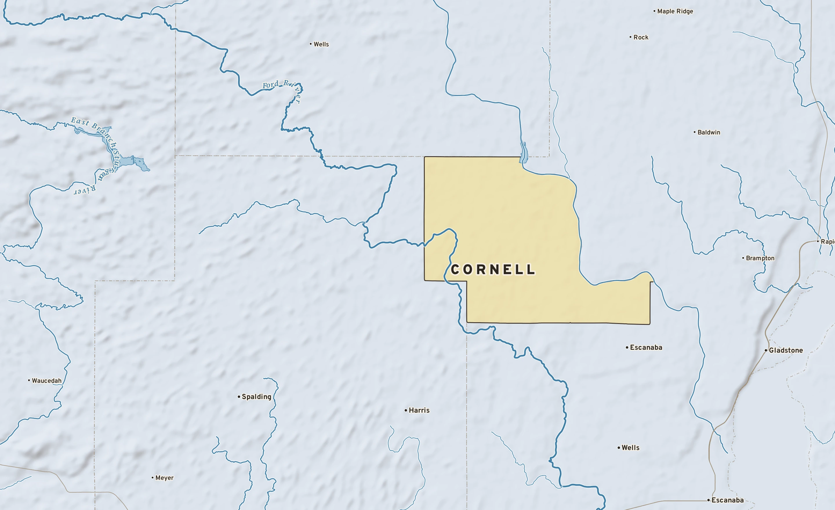 Shaded-relief atlas plate of Cornell, Michigan: rivers, roads, the city limits and where the water drains.