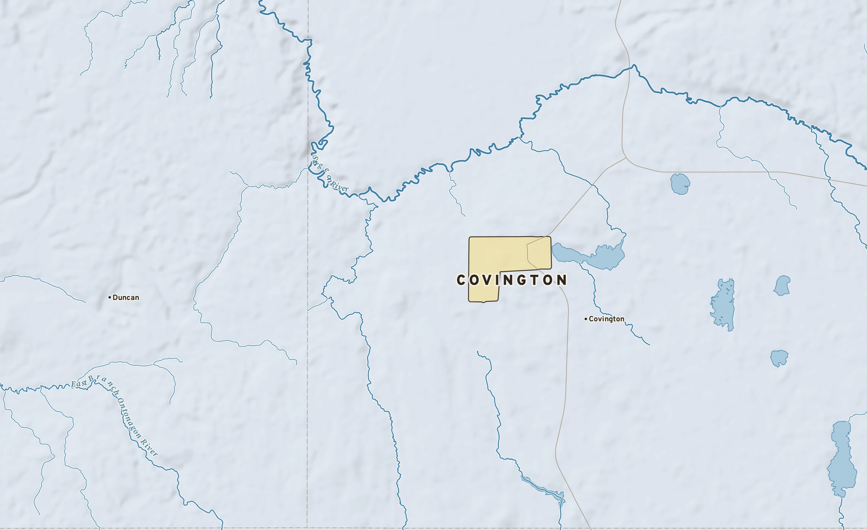 Shaded-relief atlas plate of Covington, Michigan: rivers, roads, the city limits and where the water drains.