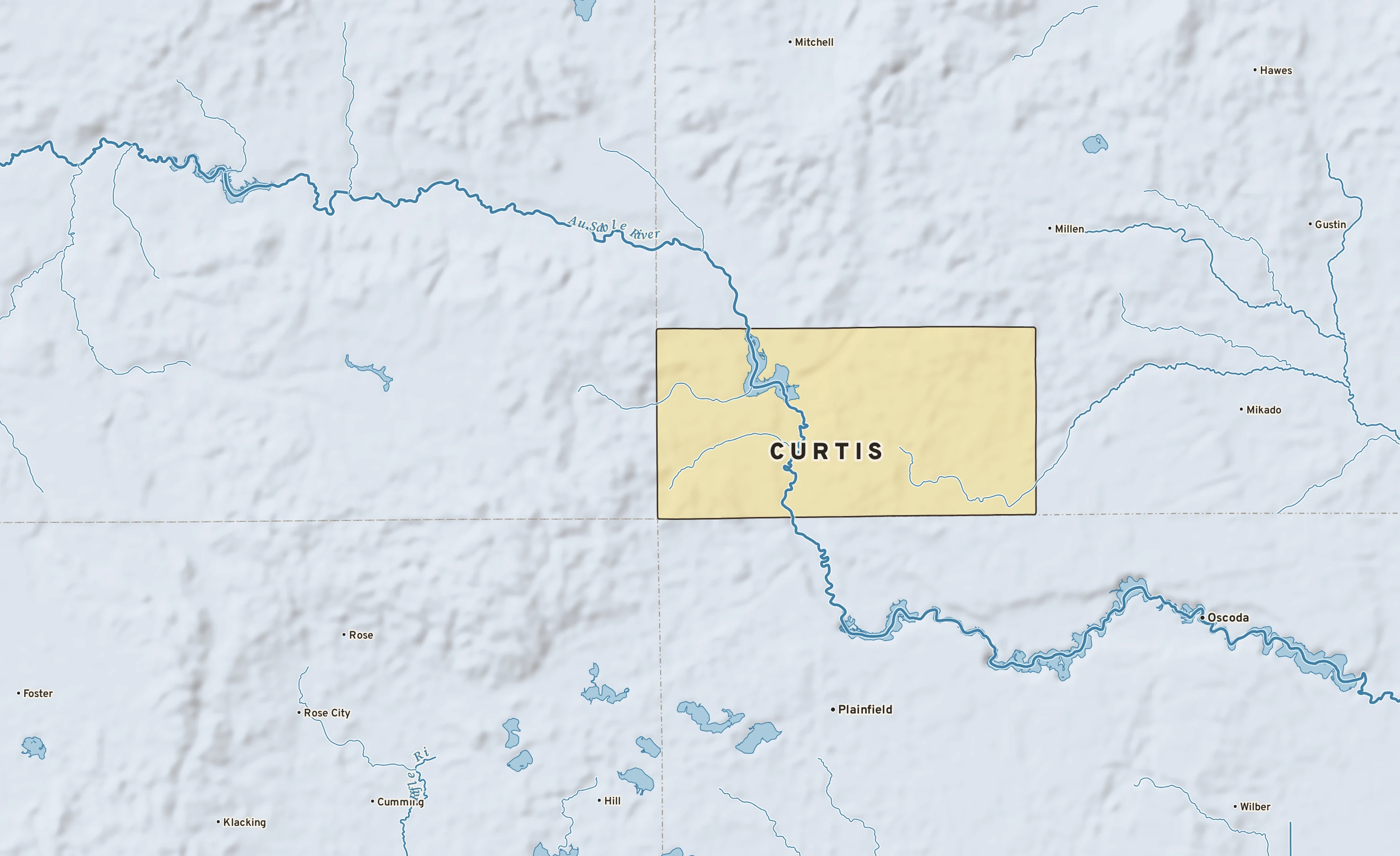 Shaded-relief atlas plate of Curtis, Michigan: rivers, roads, the city limits and where the water drains.