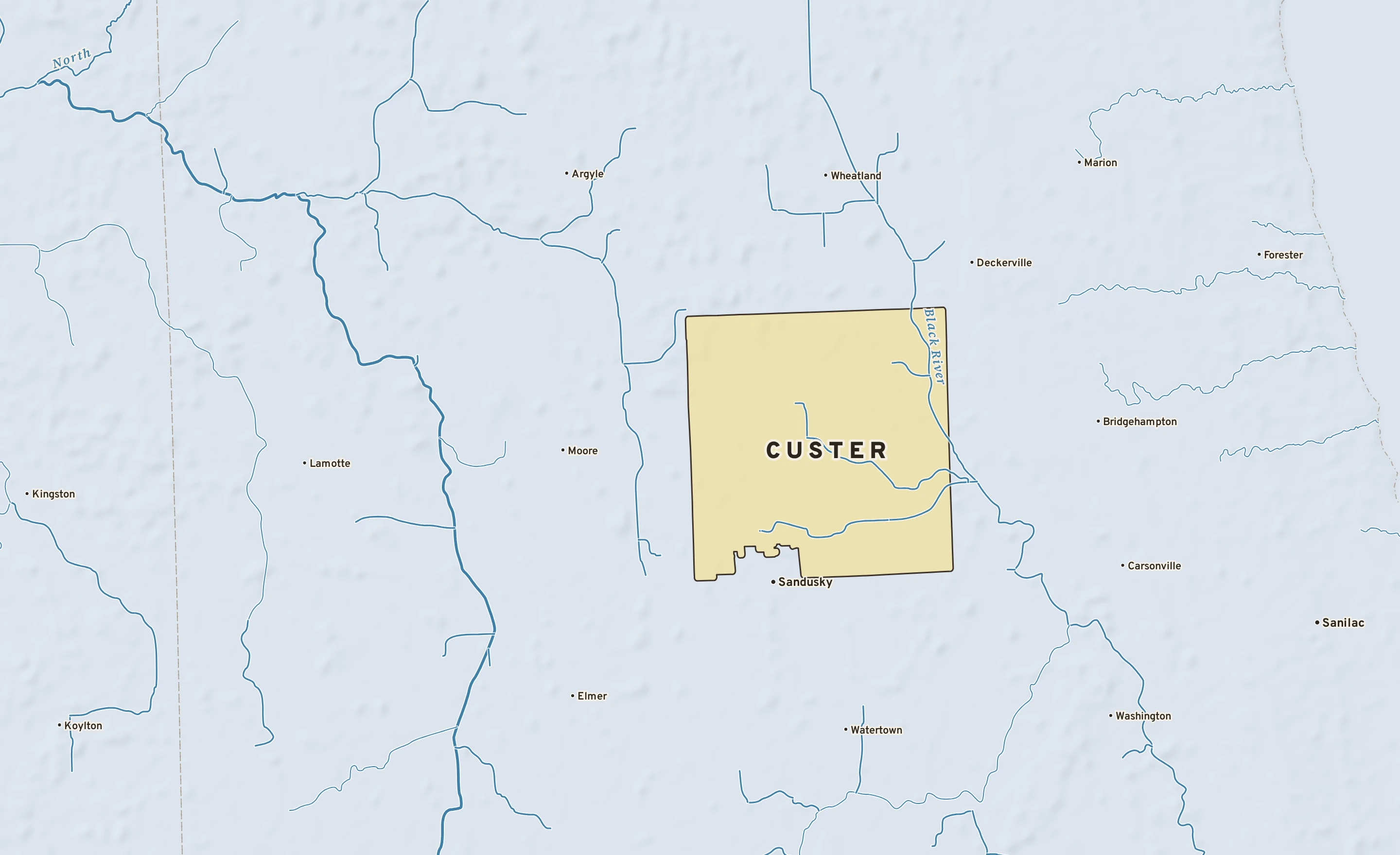 Shaded-relief atlas plate of Custer, Michigan: rivers, roads, the city limits and where the water drains.