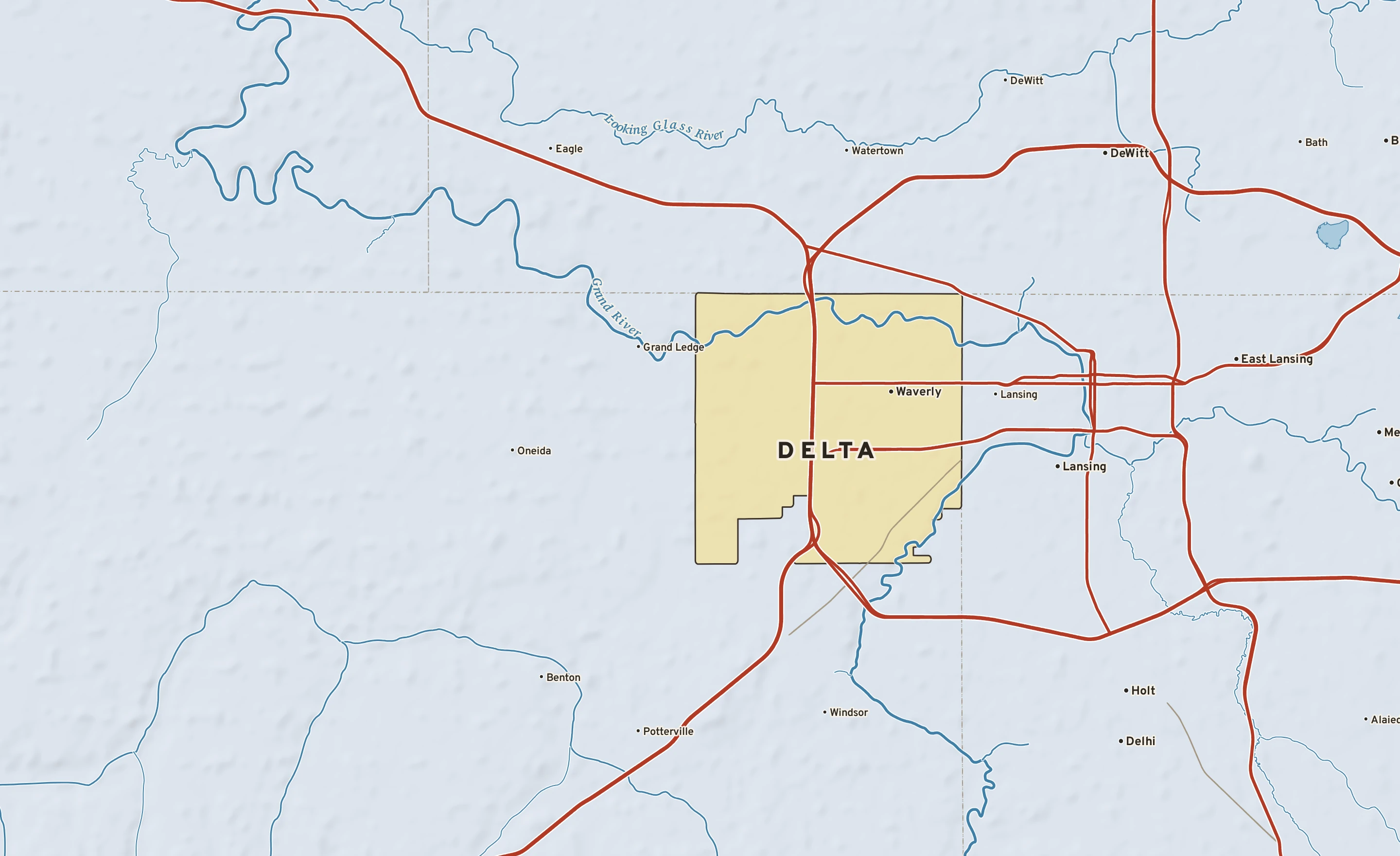 Shaded-relief atlas plate of Delta, Michigan: rivers, roads, the city limits and where the water drains.