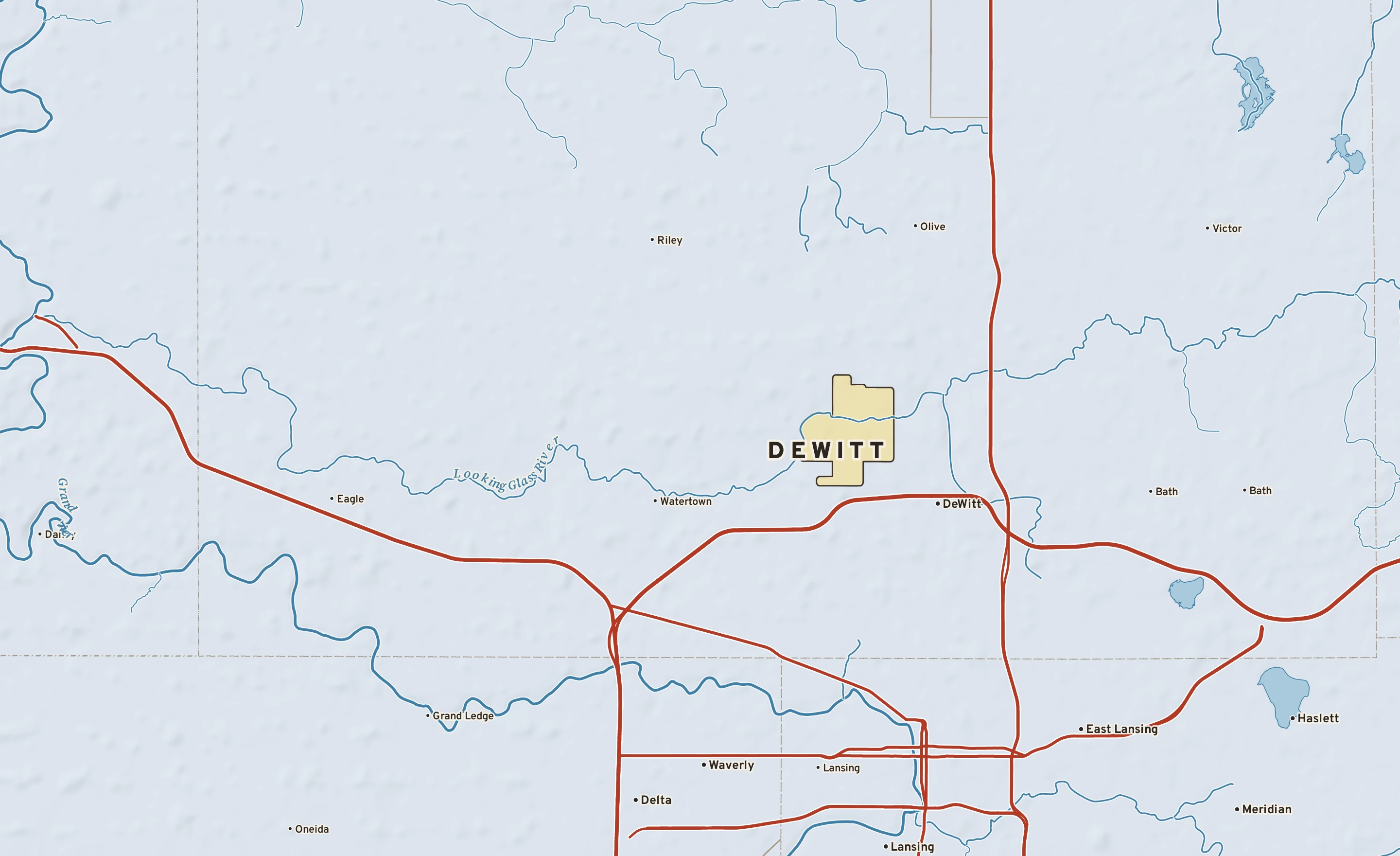 Shaded-relief atlas plate of DeWitt, Michigan: rivers, roads, the city limits and where the water drains.