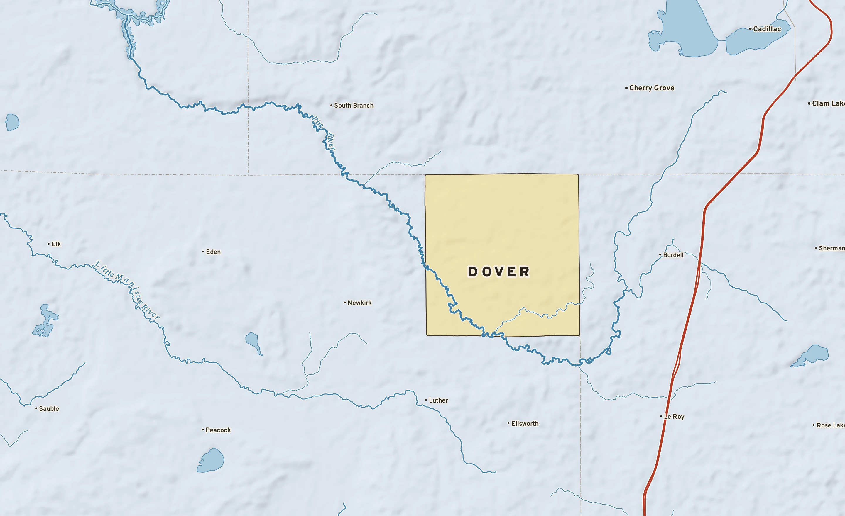 Shaded-relief atlas plate of Dover, Michigan: rivers, roads, the city limits and where the water drains.