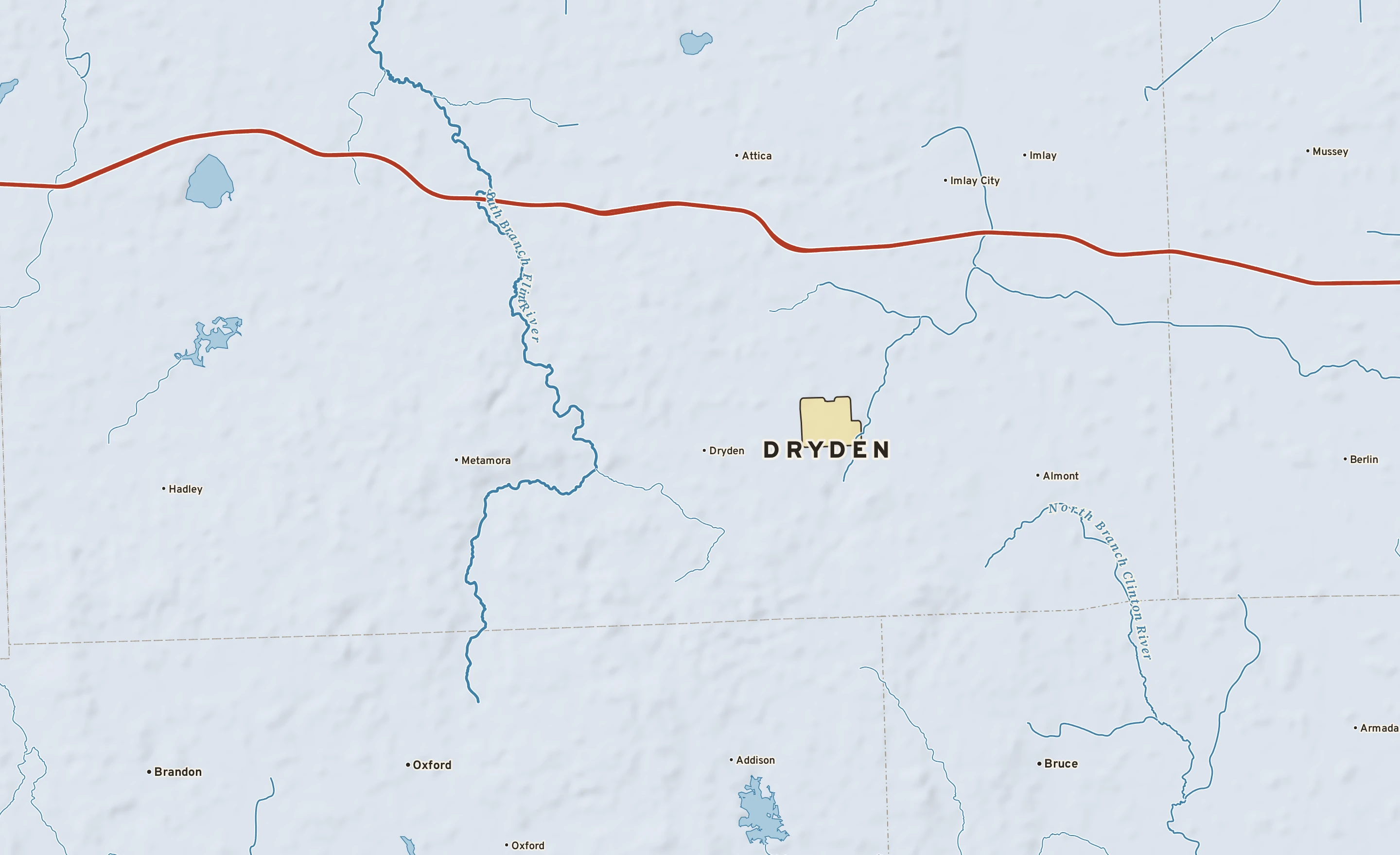 Shaded-relief atlas plate of Dryden, Michigan: rivers, roads, the city limits and where the water drains.