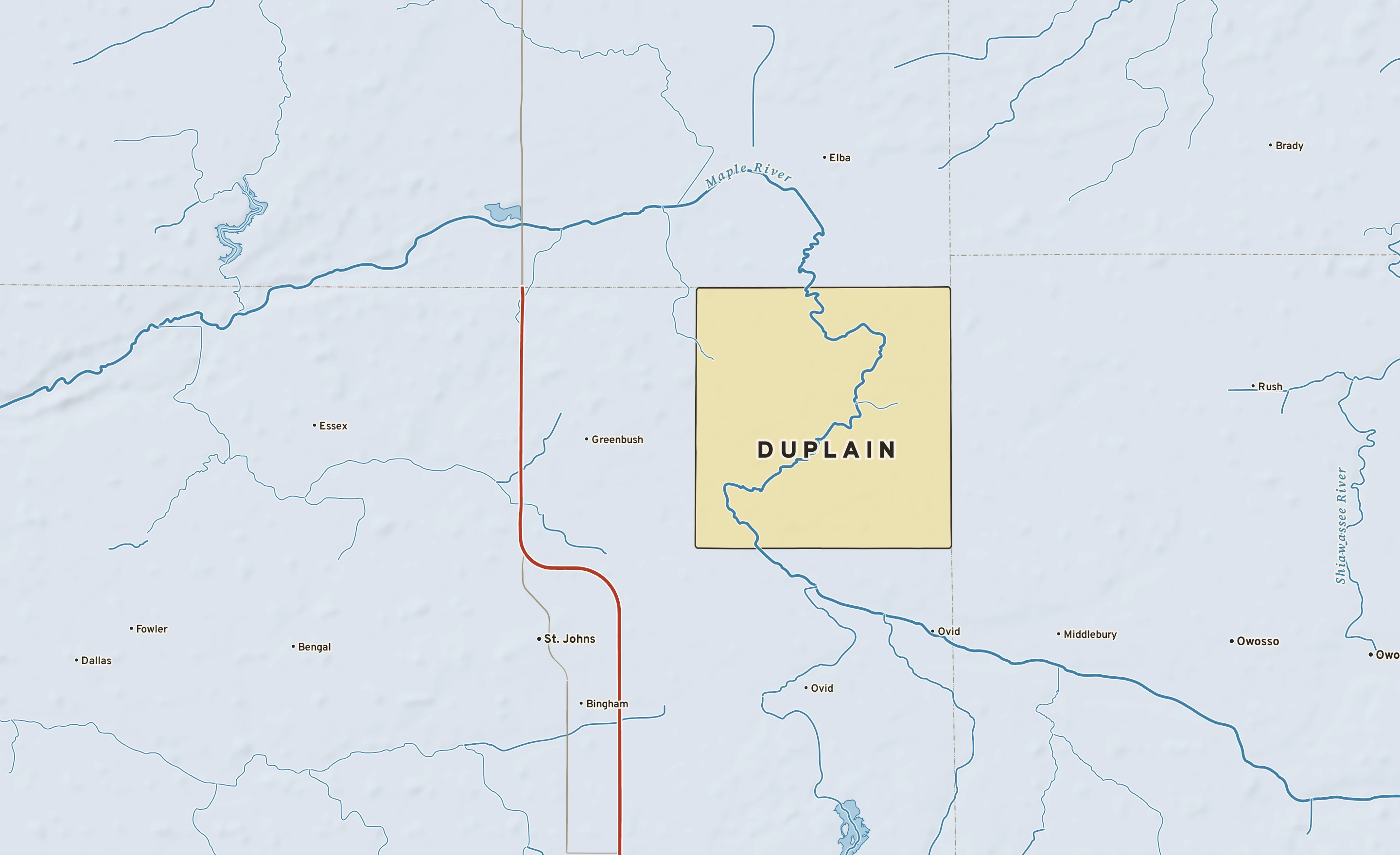 Shaded-relief atlas plate of Duplain, Michigan: rivers, roads, the city limits and where the water drains.