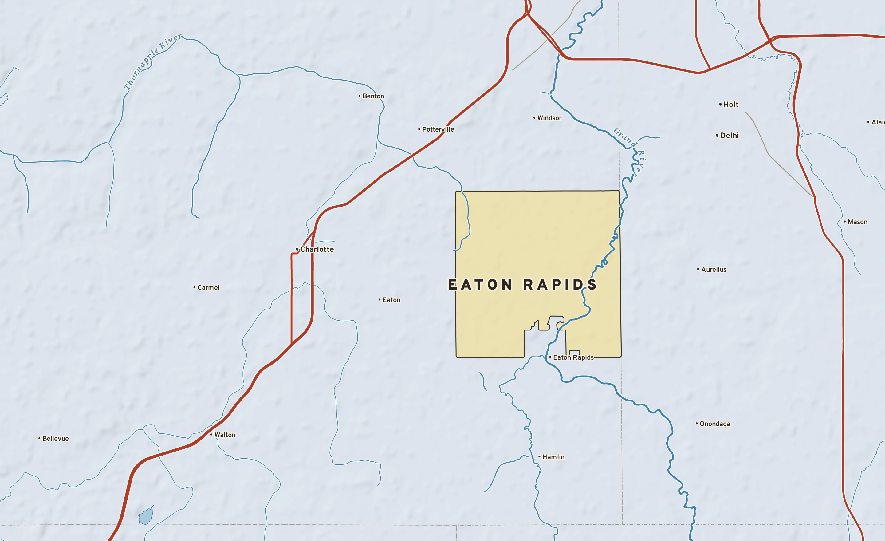 Shaded-relief atlas plate of Eaton Rapids, Michigan: rivers, roads, the city limits and where the water drains.