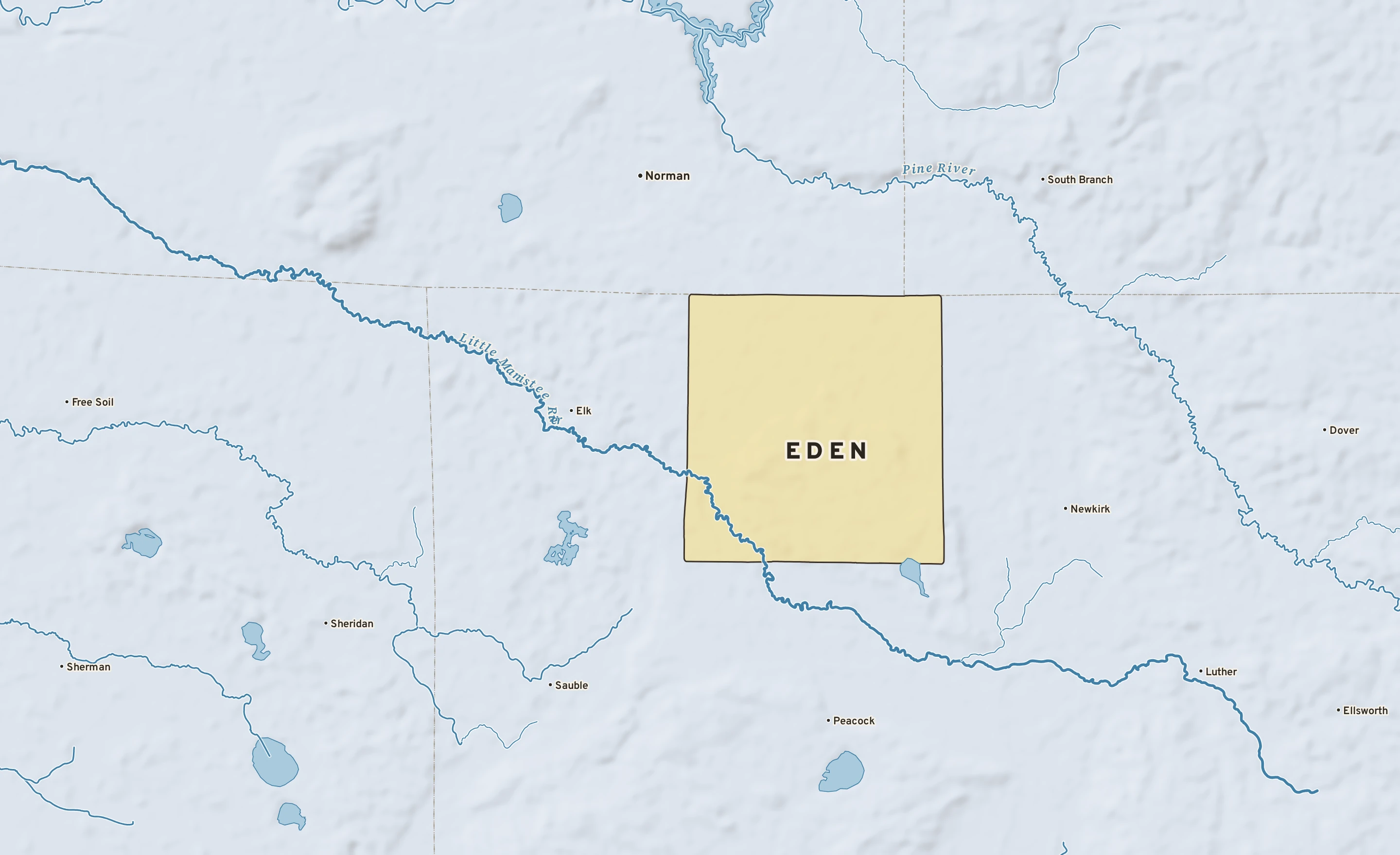 Shaded-relief atlas plate of Eden, Michigan: rivers, roads, the city limits and where the water drains.