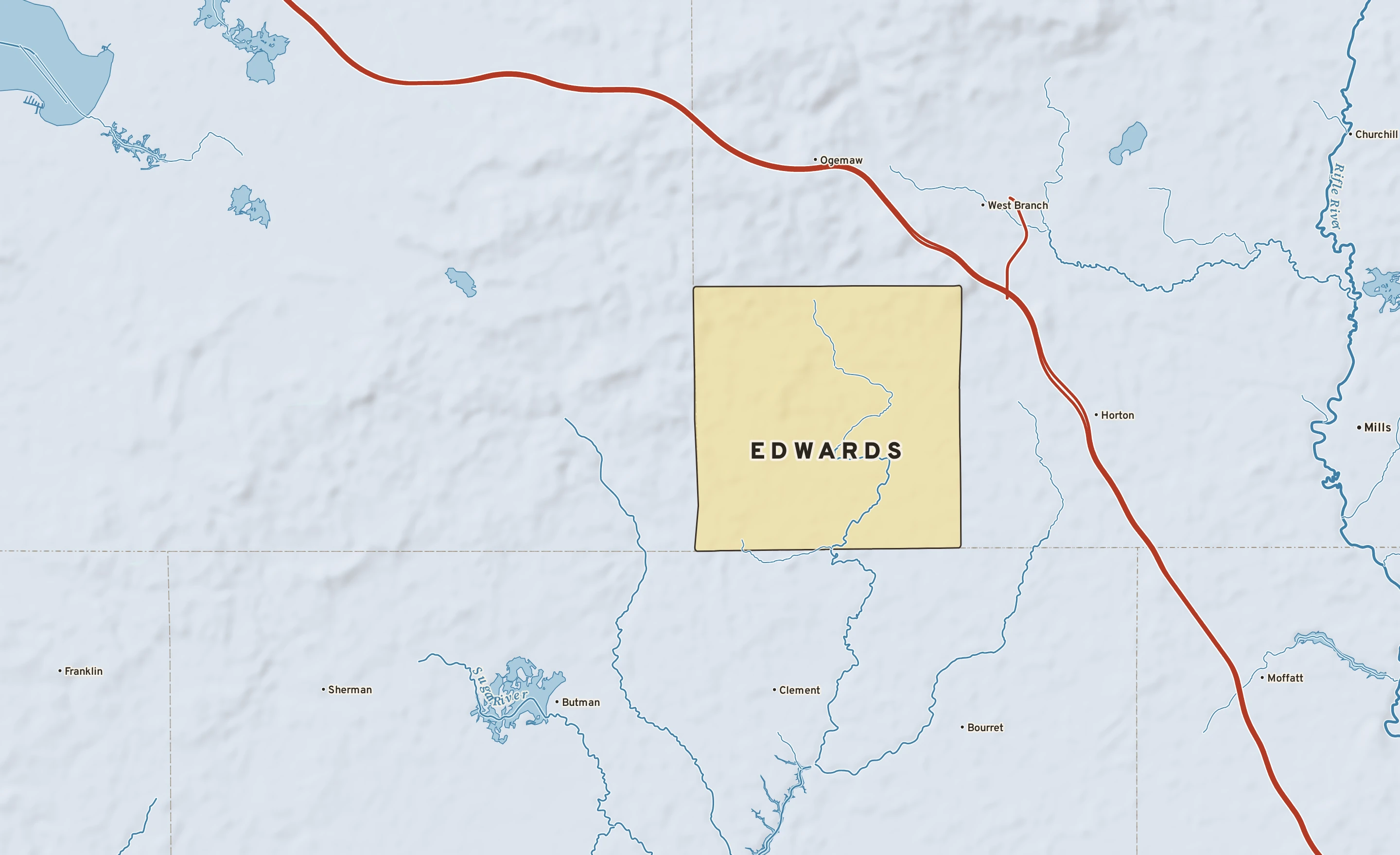 Shaded-relief atlas plate of Edwards, Michigan: rivers, roads, the city limits and where the water drains.