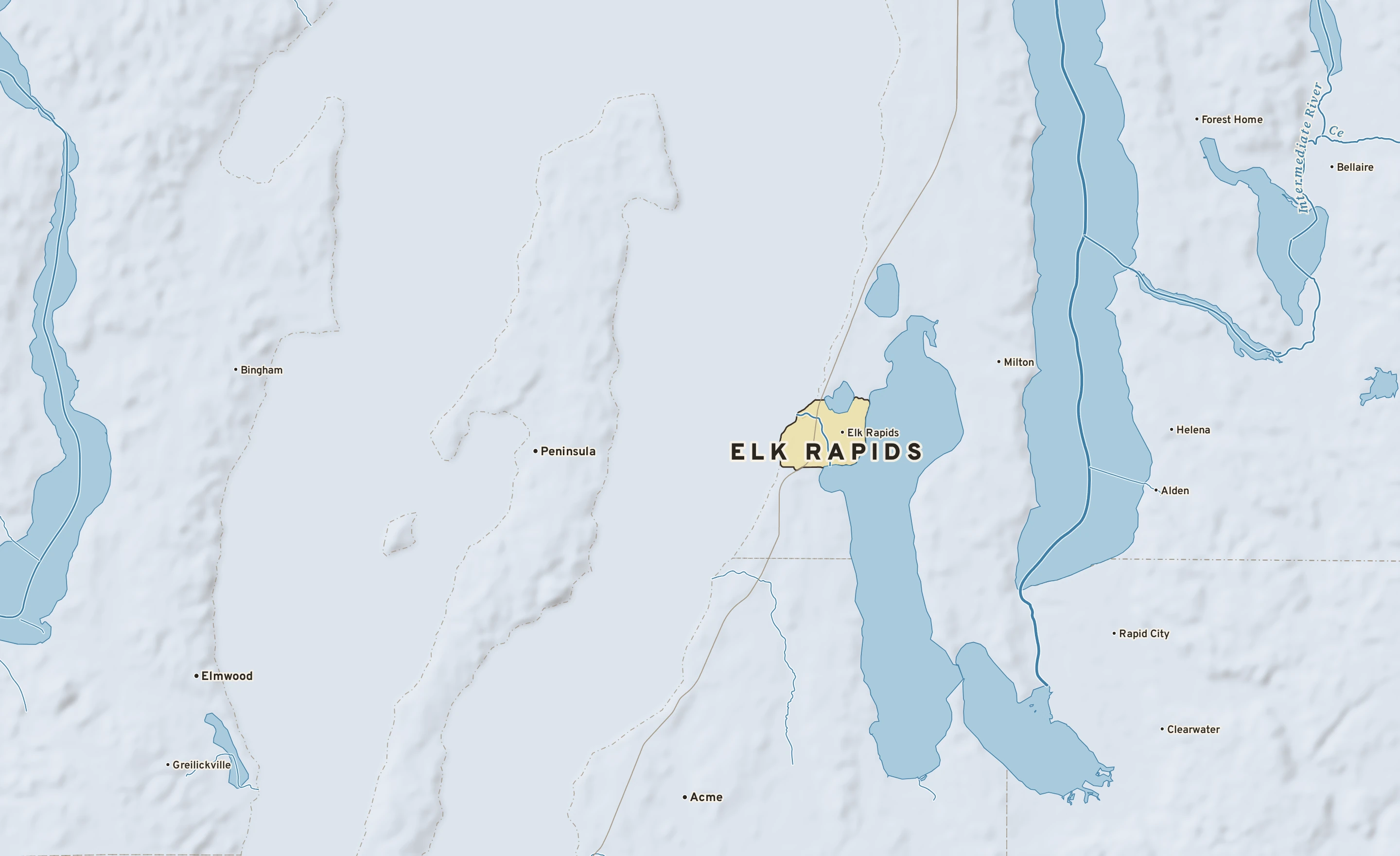 Shaded-relief atlas plate of Elk Rapids, Michigan: rivers, roads, the city limits and where the water drains.