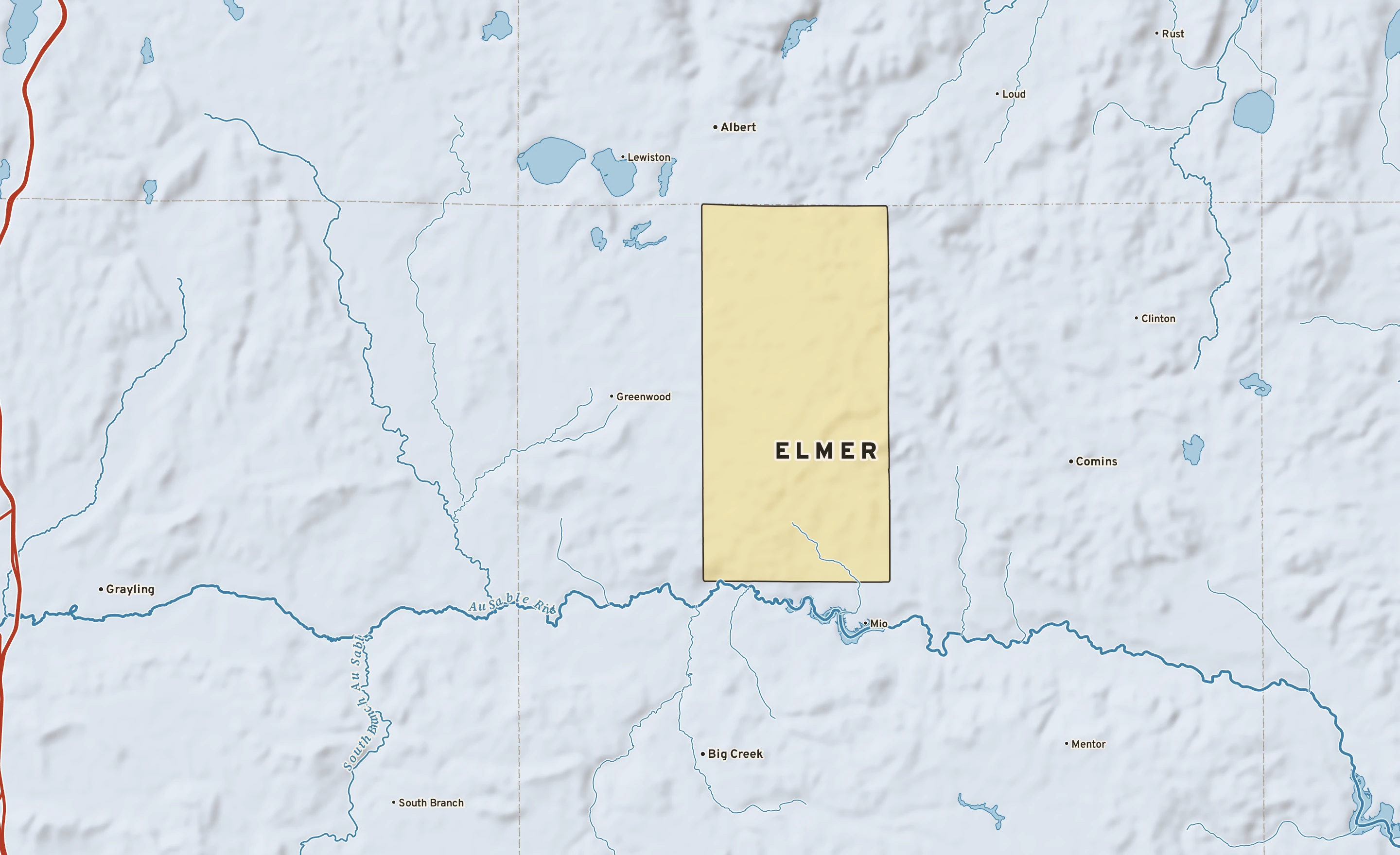 Shaded-relief atlas plate of Elmer, Michigan: rivers, roads, the city limits and where the water drains.