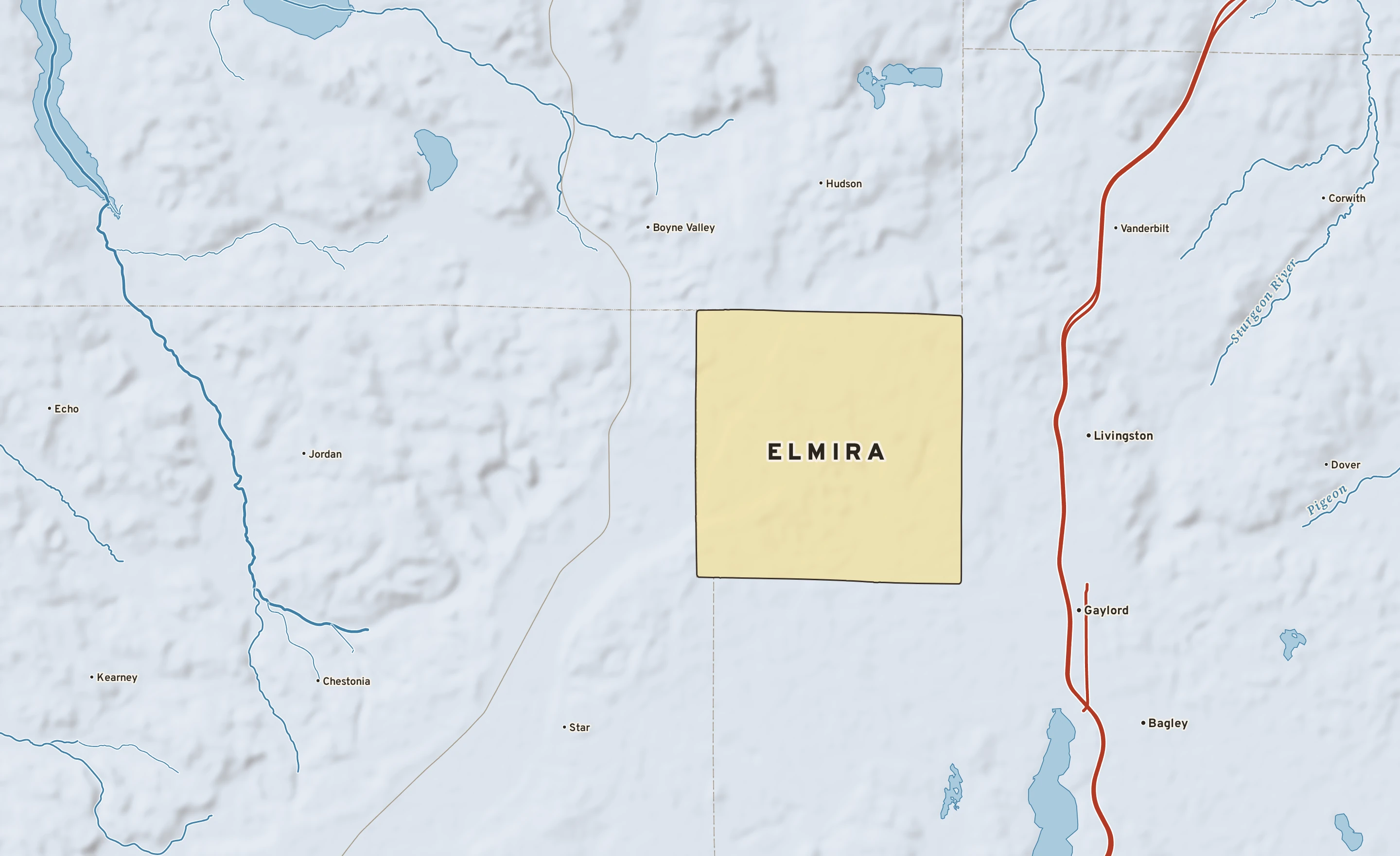 Shaded-relief atlas plate of Elmira, Michigan: rivers, roads, the city limits and where the water drains.