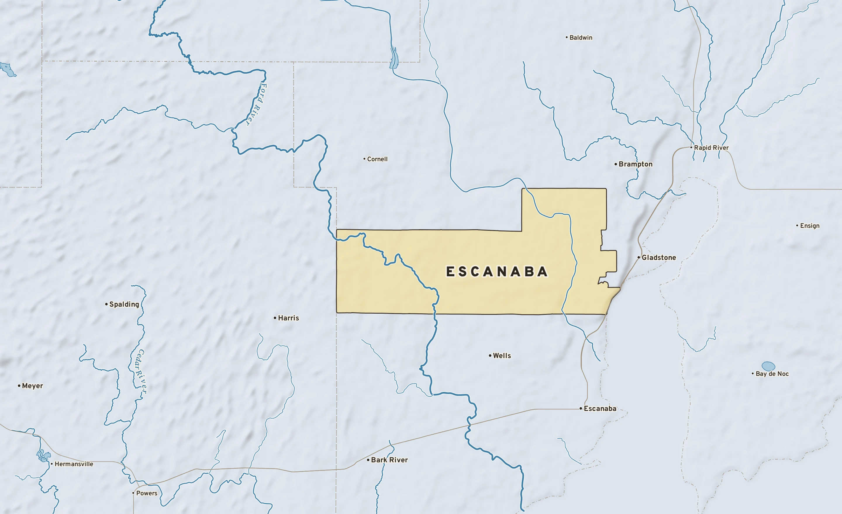 Shaded-relief atlas plate of Escanaba, Michigan: rivers, roads, the city limits and where the water drains.
